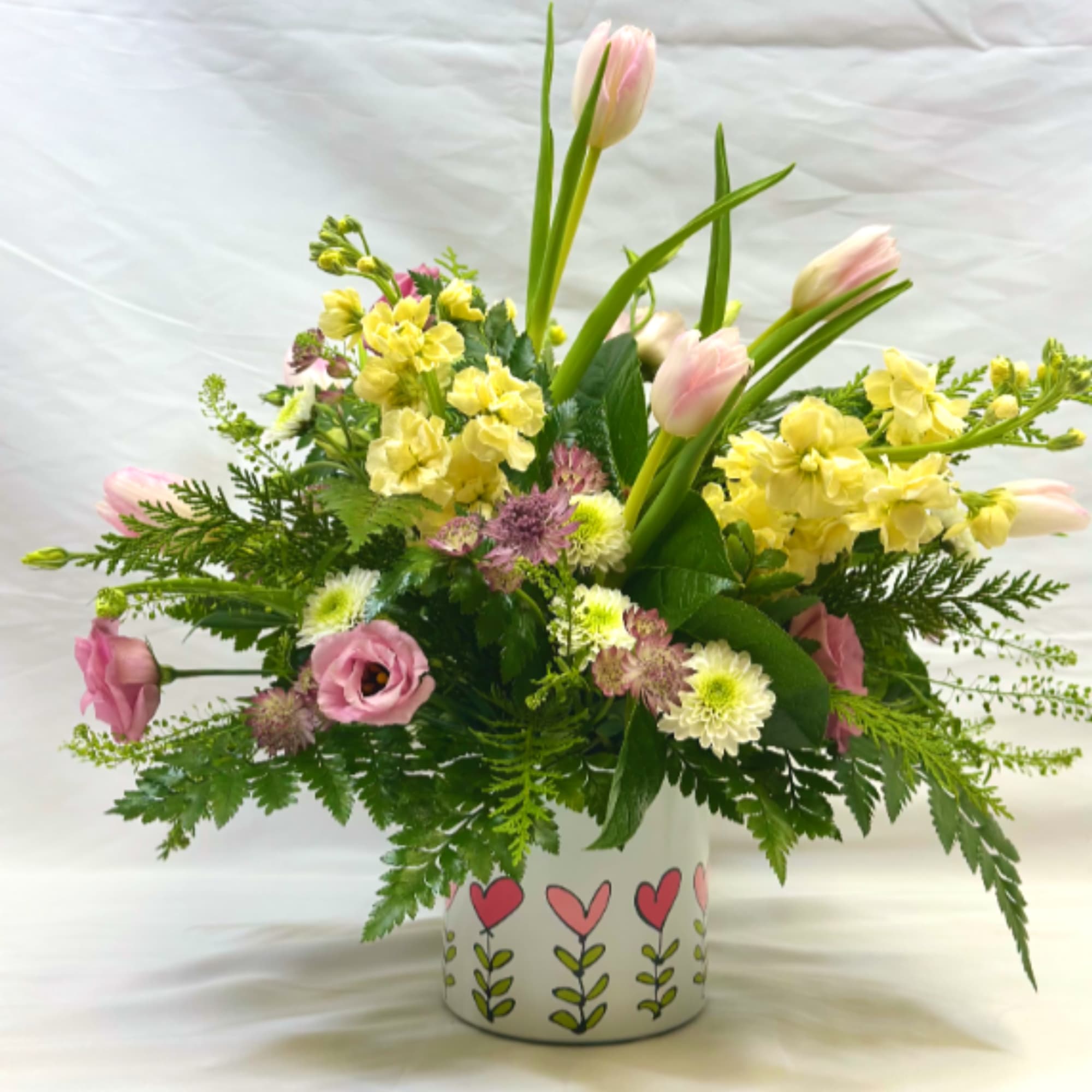 This Leary's Flowers exclusive design captures the beauty and elegance of Spring