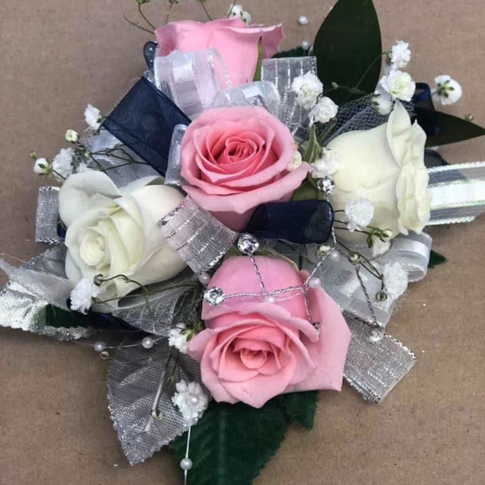 Ladies&rsquo; wrist corsage for prom&mdash;be sure to include your preferred colors in