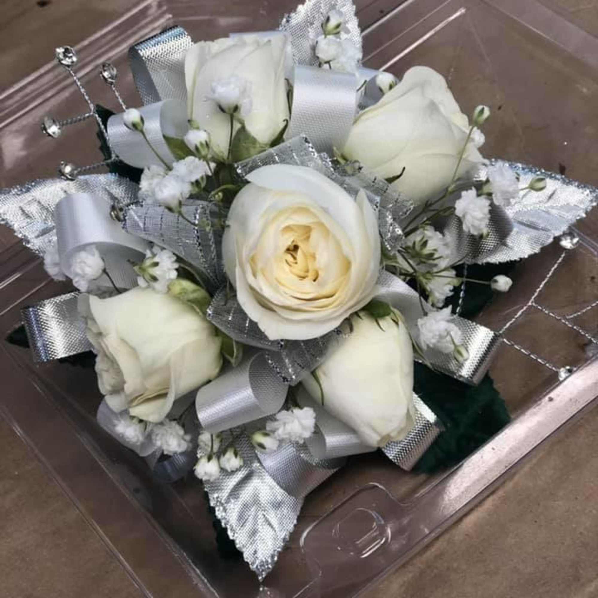 Ladies&rsquo; wrist corsage for prom&mdash;be sure to include your preferred colors in