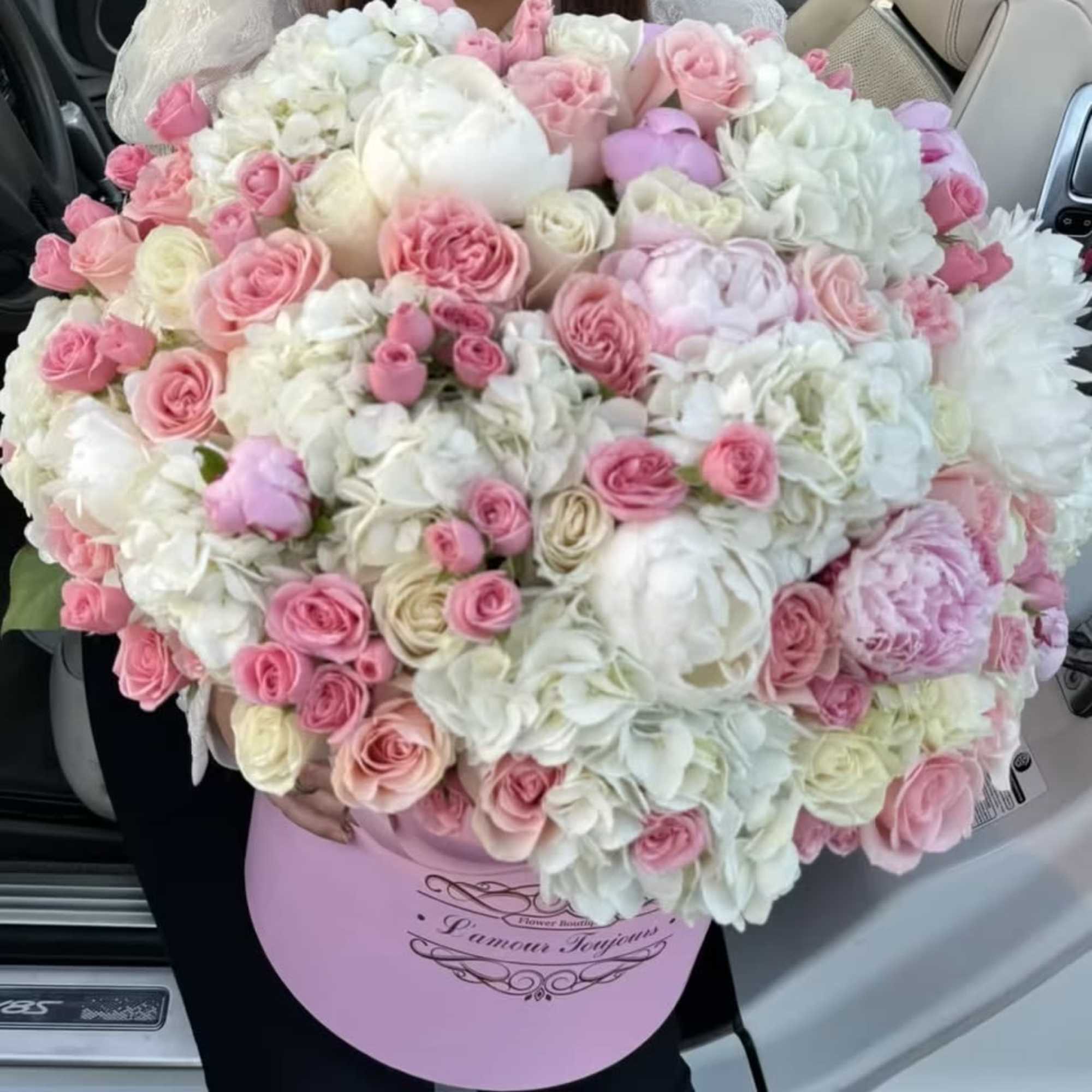 Grand mix of peonies, hydrangeas, roses and spray roses in our signature