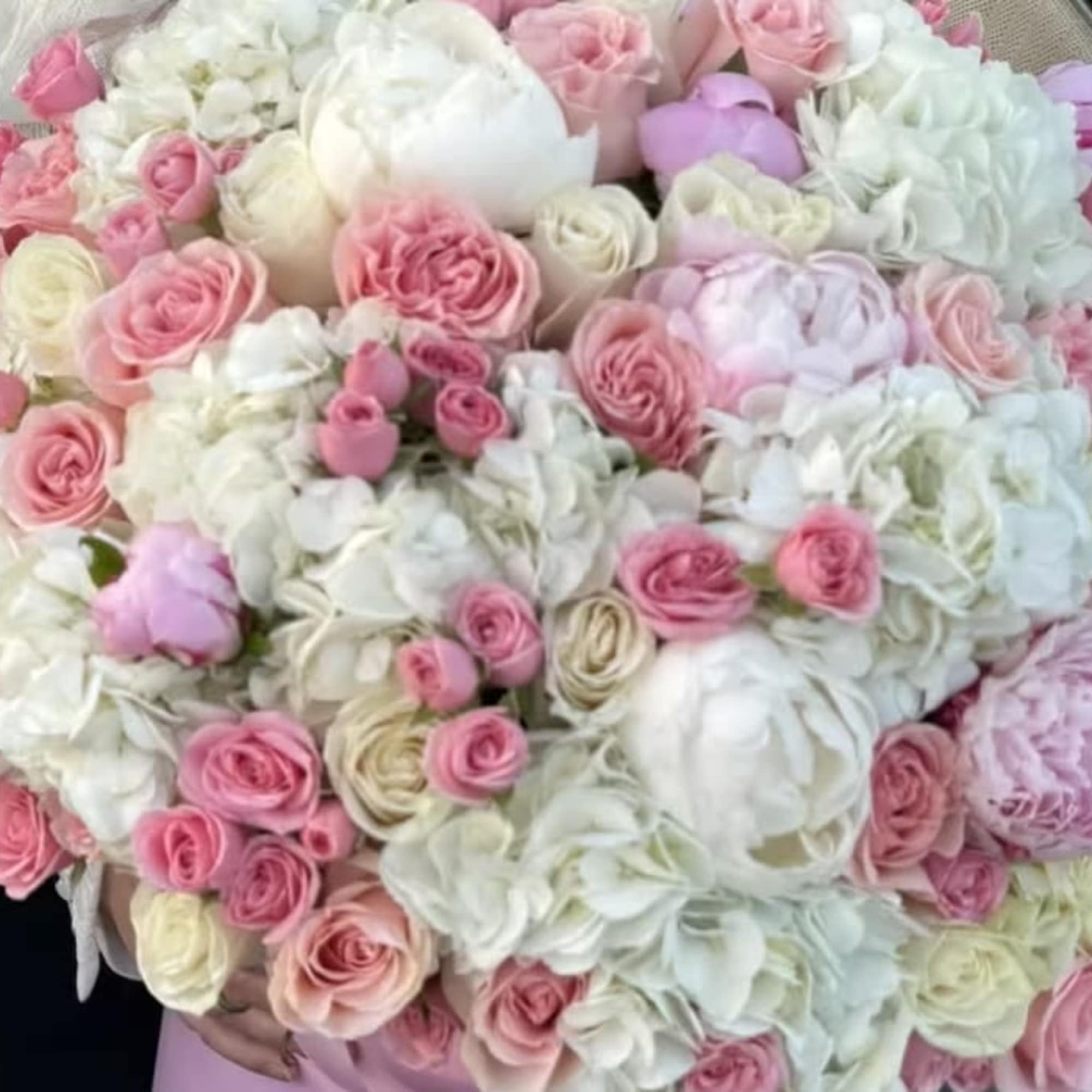 Grand mix of peonies, hydrangeas, roses and spray roses in our signature