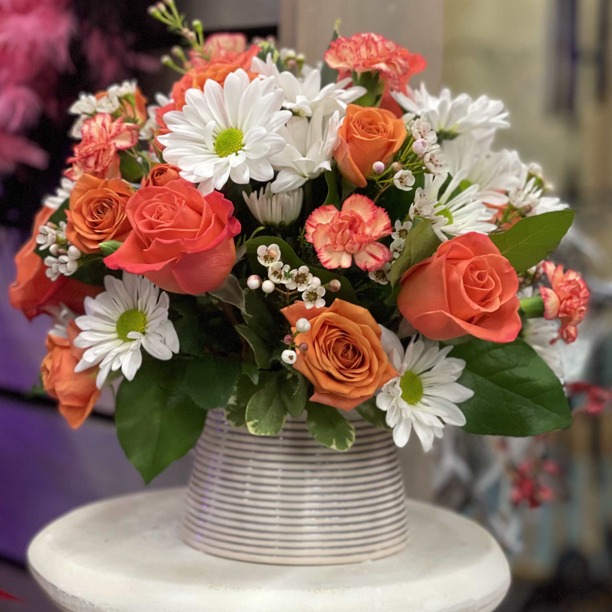 Bright blooms for any occasion.  A sweet little all around arrangement.