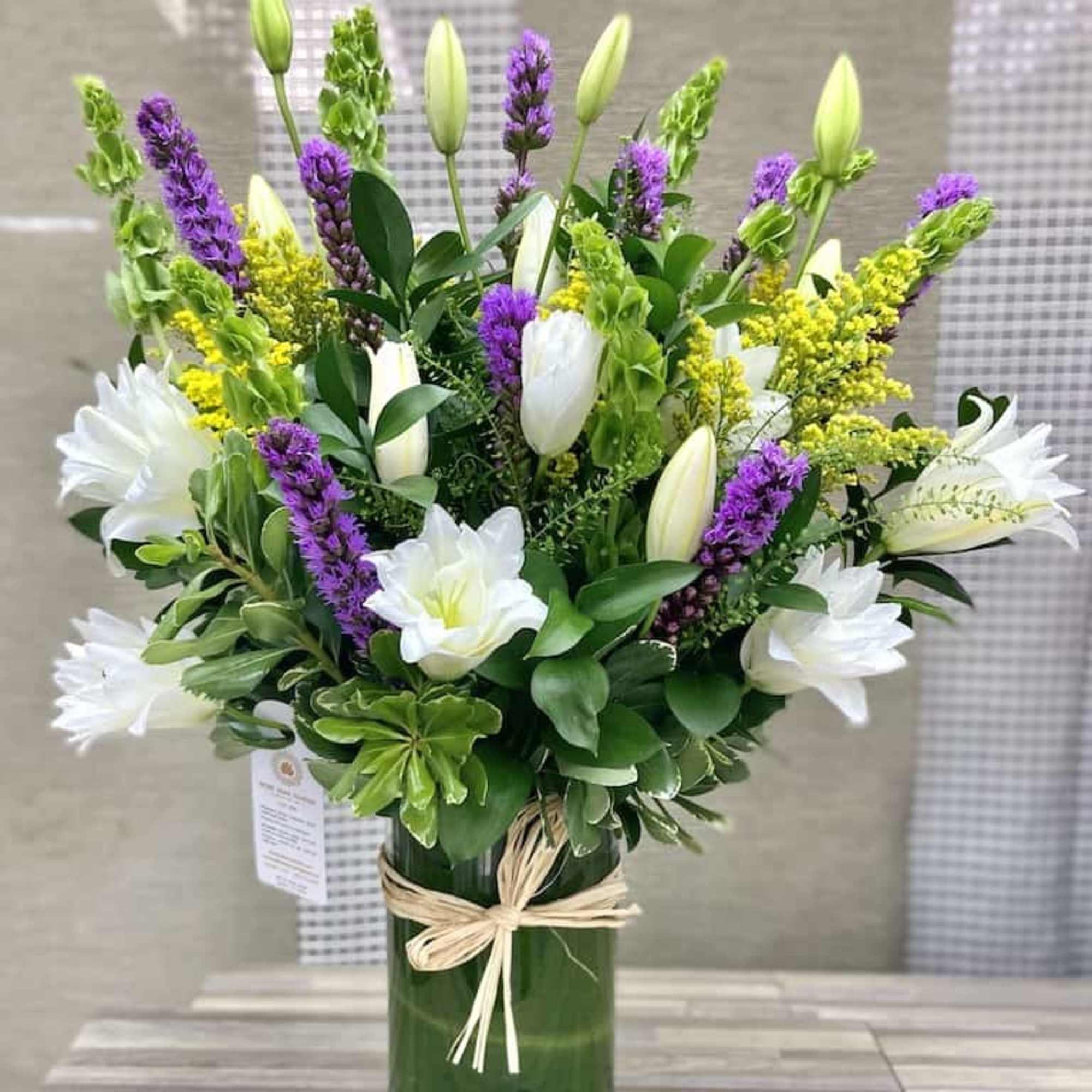 Lilies Splash Bouquet: Beautiful white lilies arrangement accented with greens, liatris, fillers