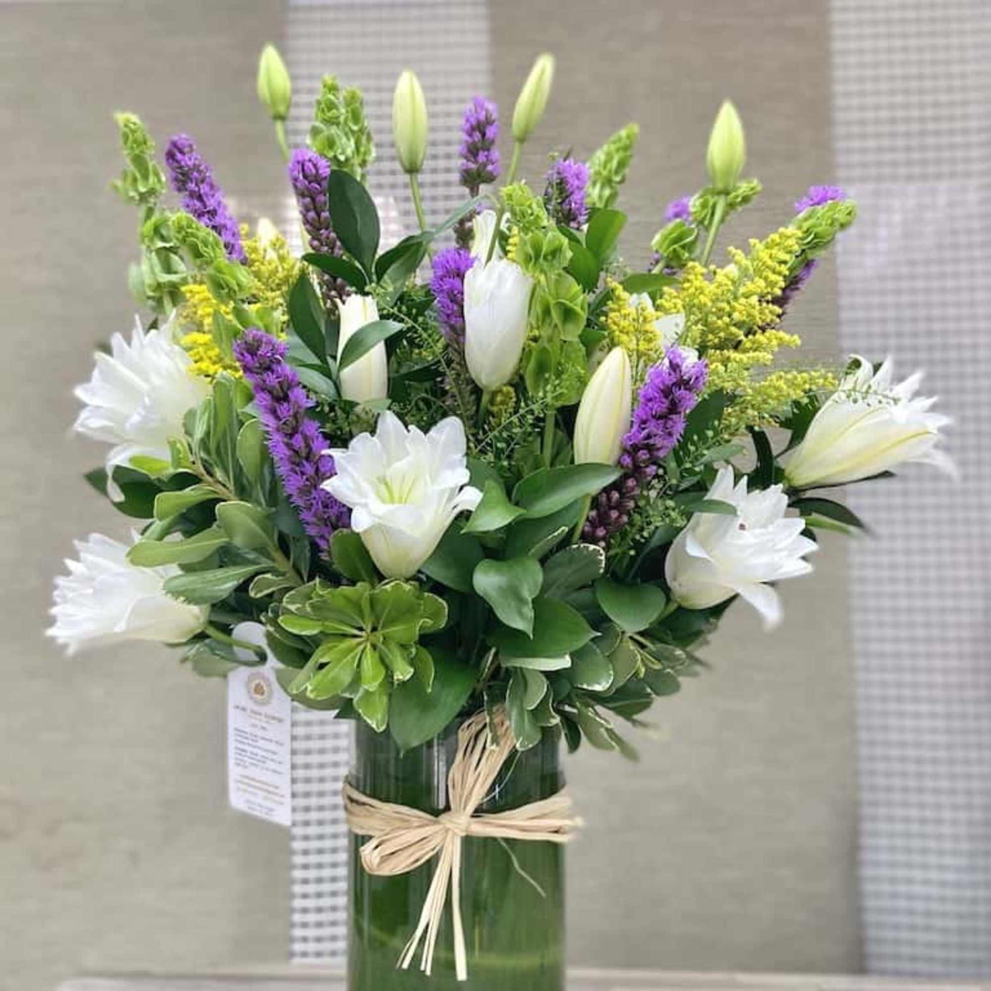 Lilies Splash Bouquet: Beautiful white lilies arrangement accented with greens, liatris, fillers