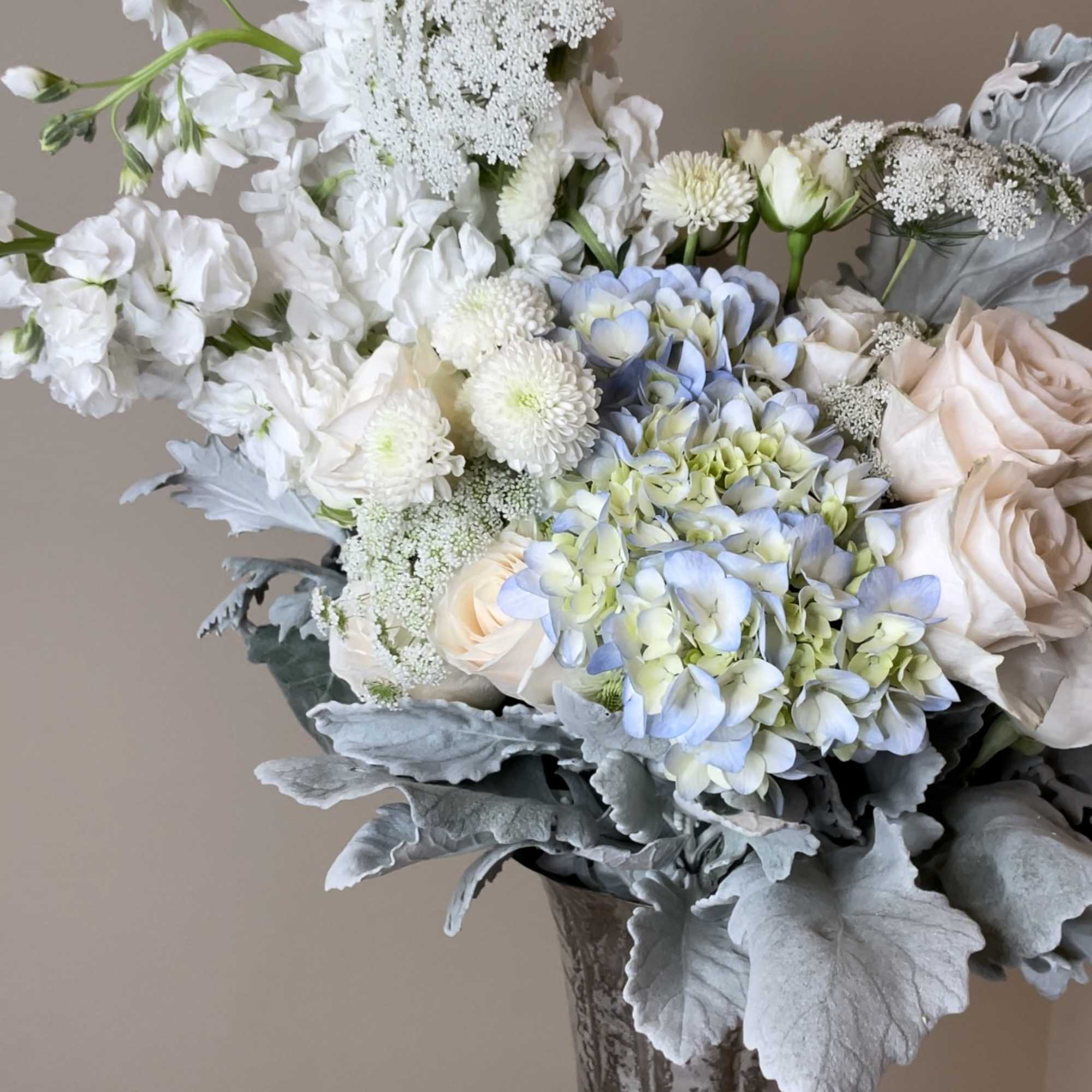 Designed as an extension of the Serenity Bouquet, this arrangement stands tall