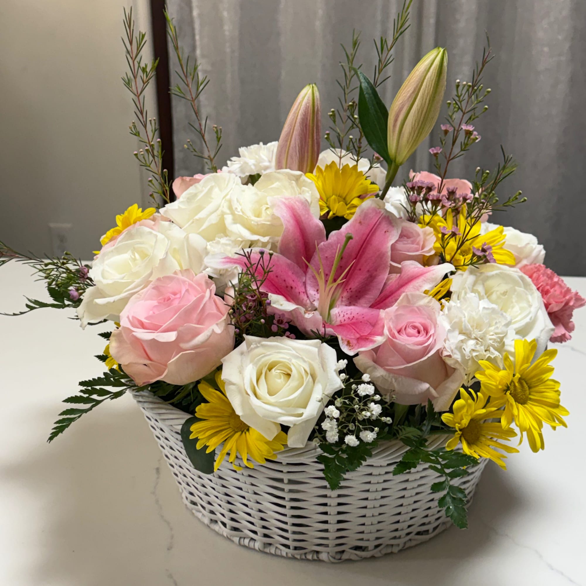 Amazing Big basket full of white, pink and roses. Yellow daisies also