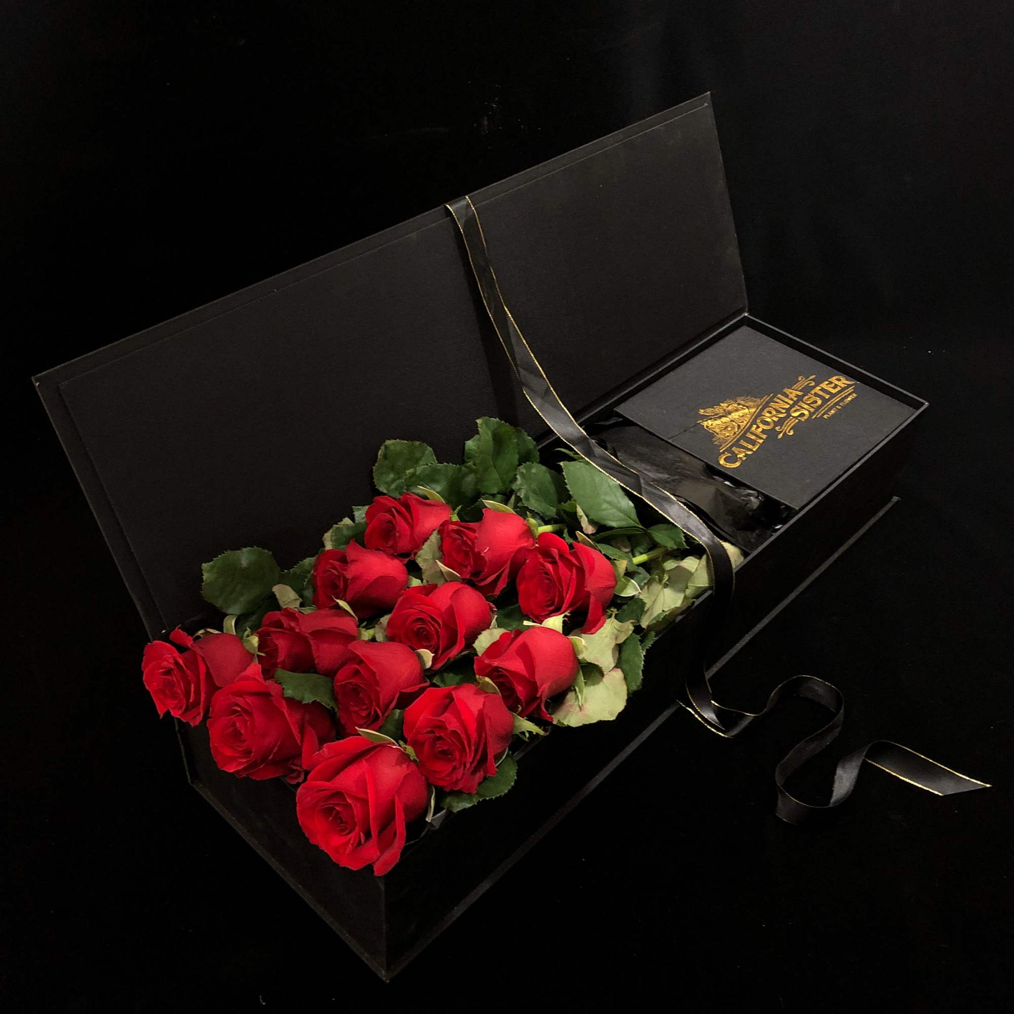 Our take on an iconic classic... a dozen (long lasting) Red Roses