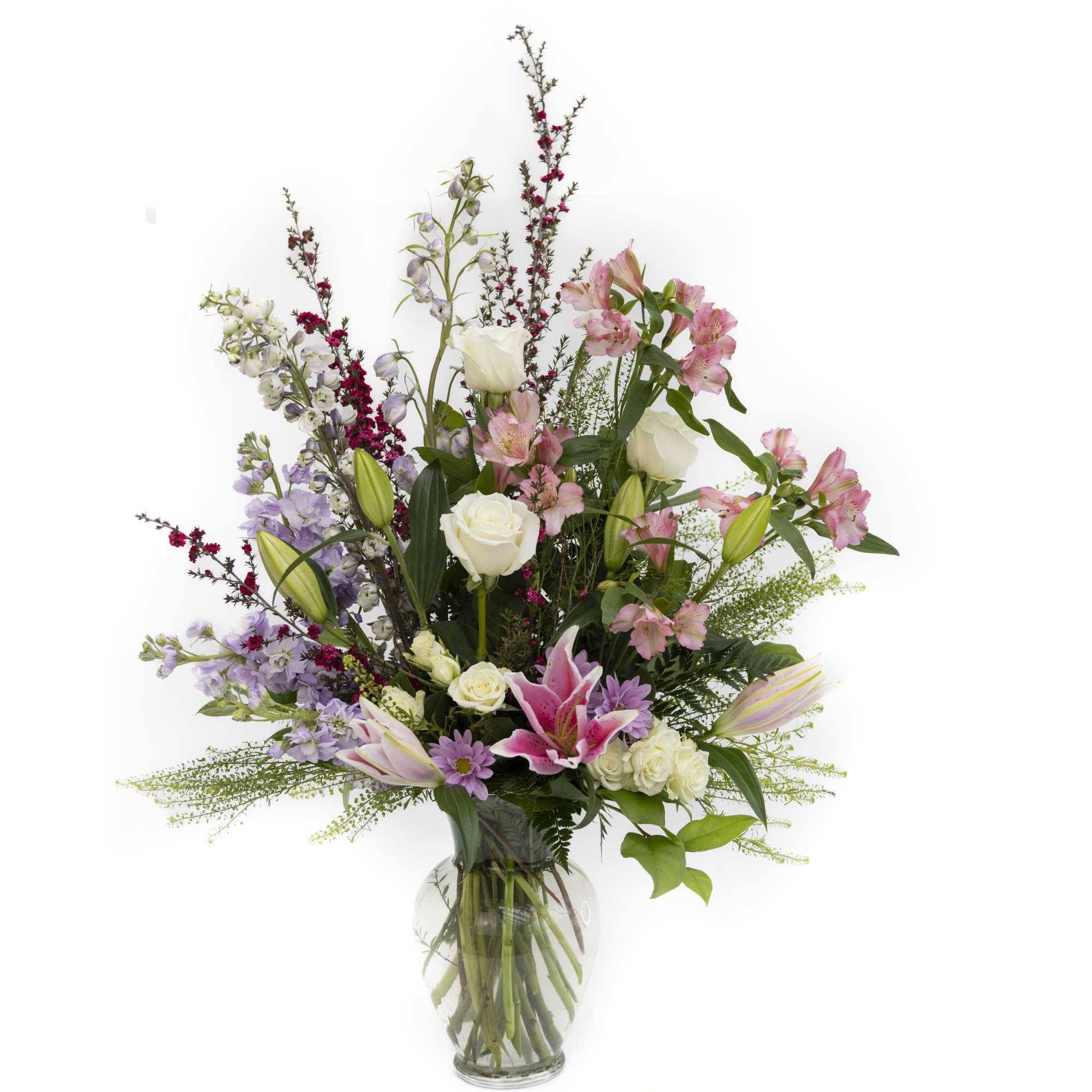 Radient embrace is a lush, garden-inspired arrangement designed to capture the beauty