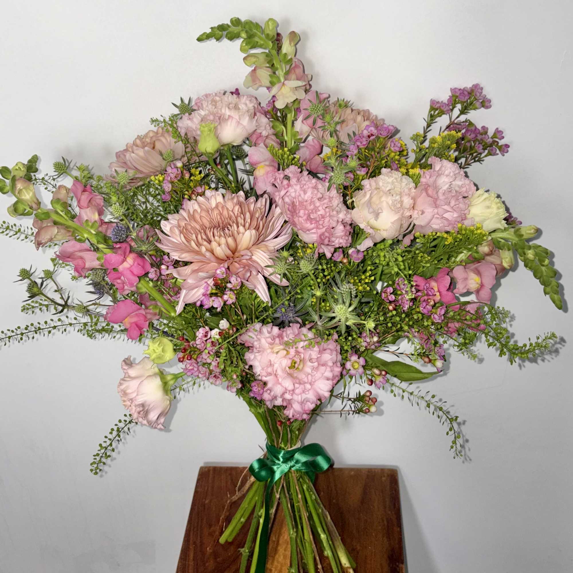 Soft, joyful, and effortlessly charming, this Mixed Pink Floral Bouquet is a