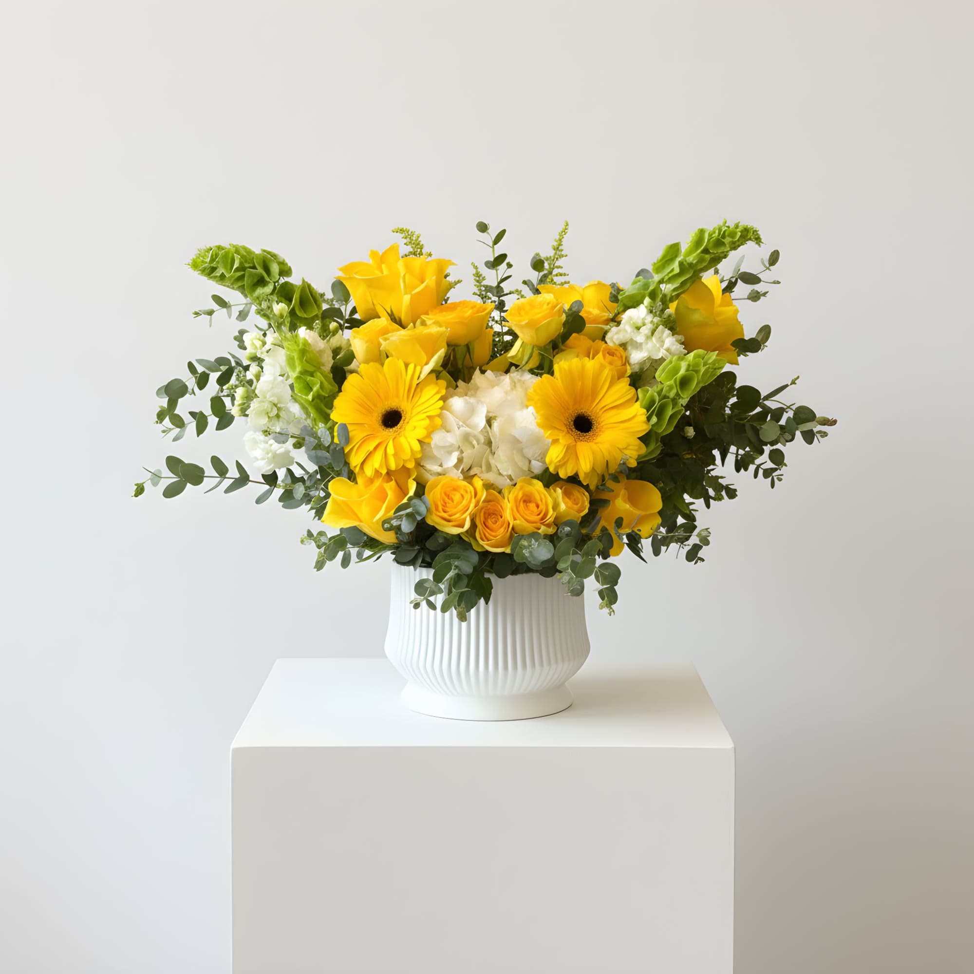 Brighten any space with our Golden Sunshine Yellow Roses &amp; Gerbera Arrangement