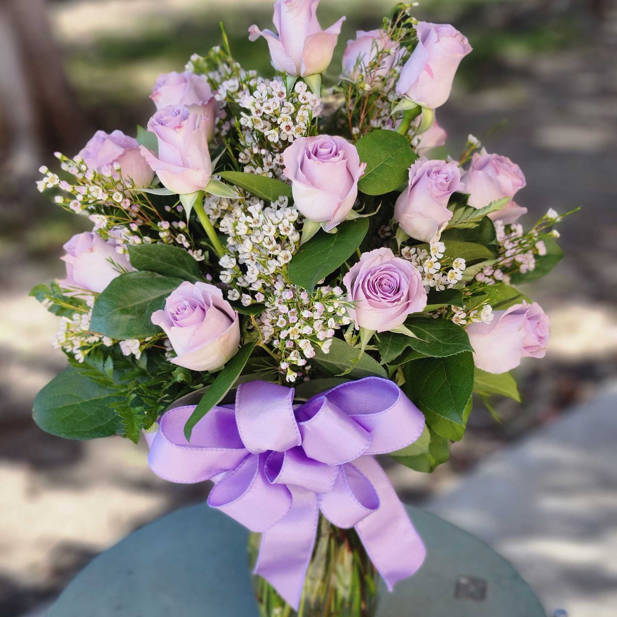 This arrangement is the perfect "pick me up" to brighten someone's day.