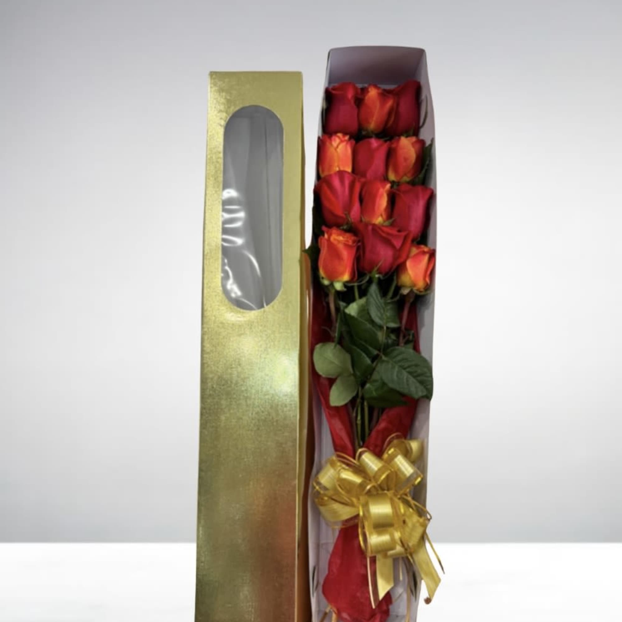 A simple yet elegant dozen roses placed in a box for a
