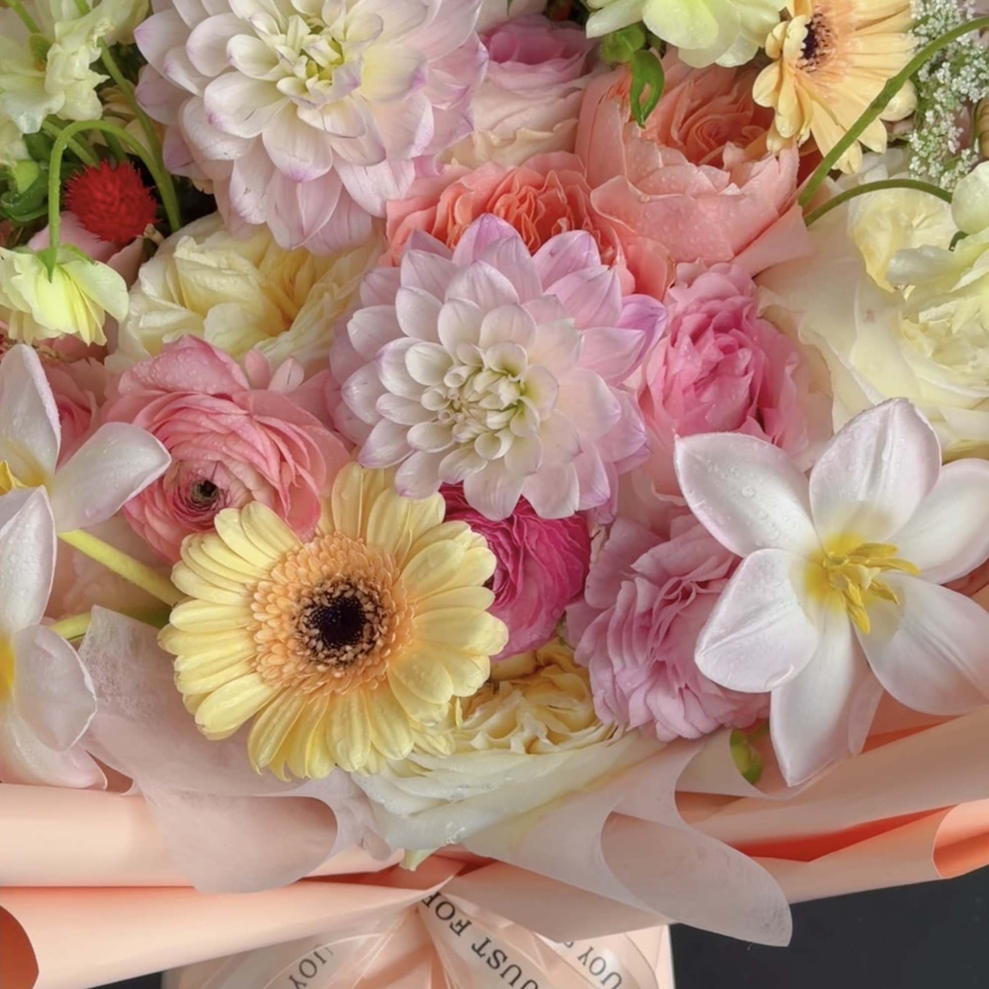 A soft and elegant bouquet featuring a beautiful mix of blush pink