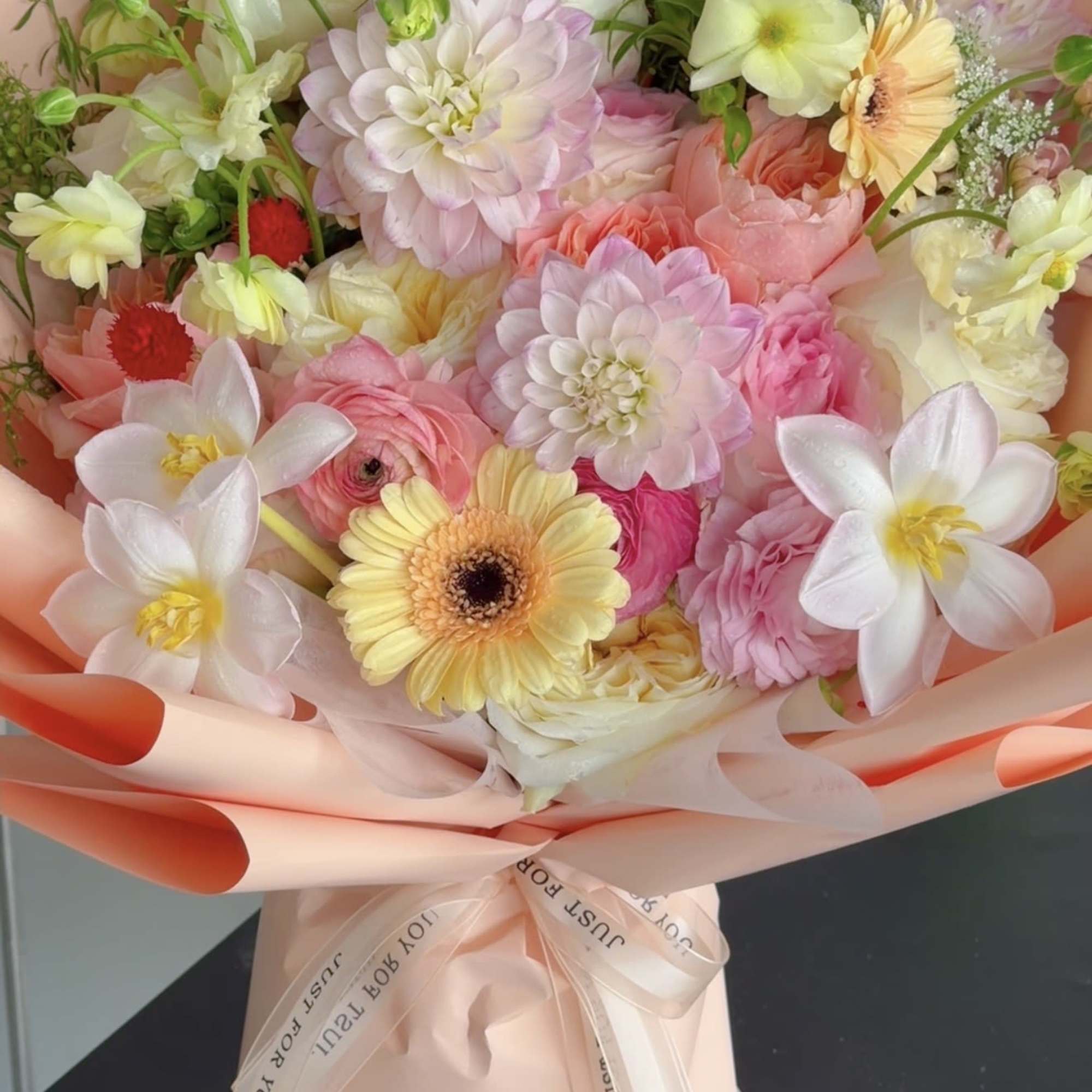 A soft and elegant bouquet featuring a beautiful mix of blush pink