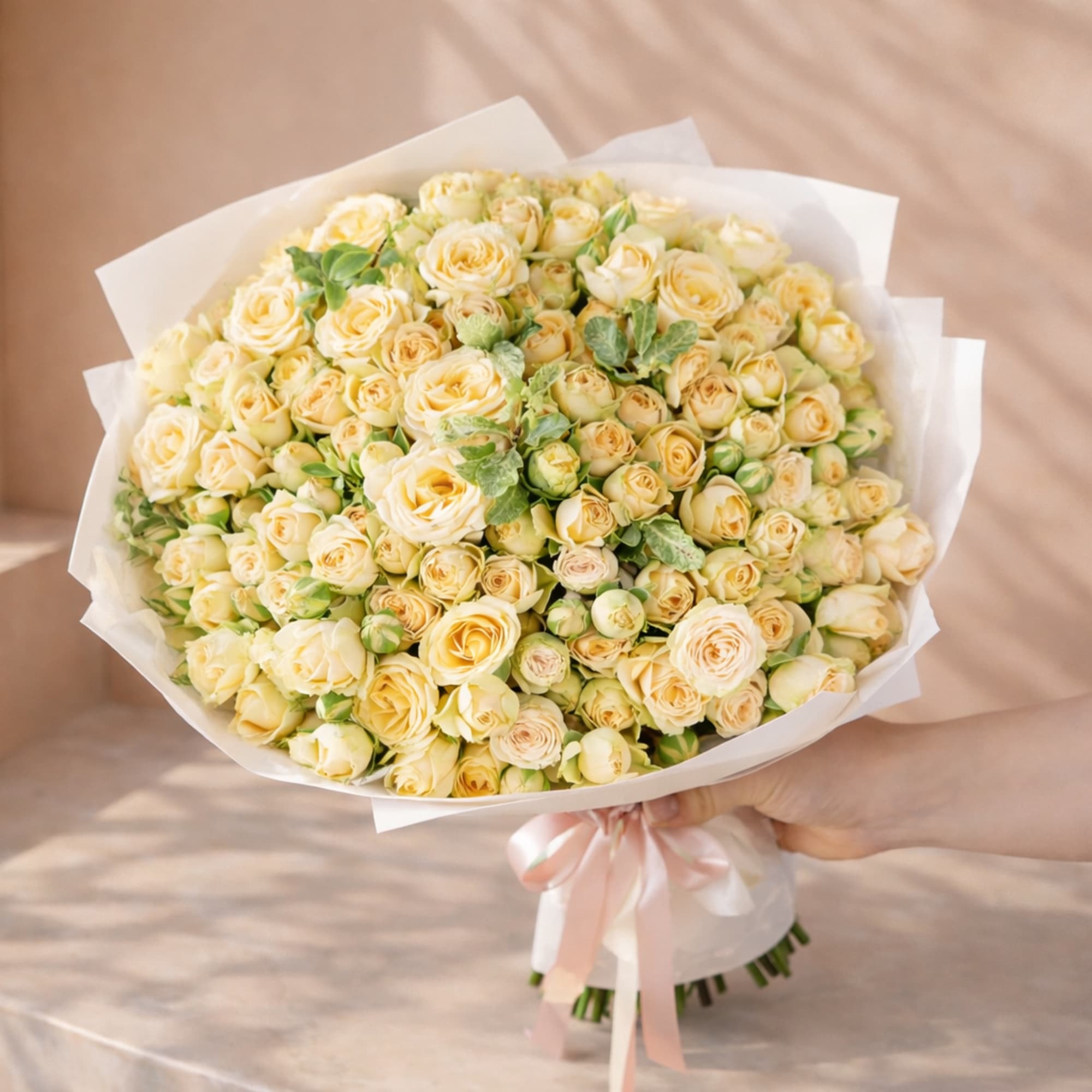 The Sweet Spray Rose Bouquet is a lovely floral gift featuring delicate