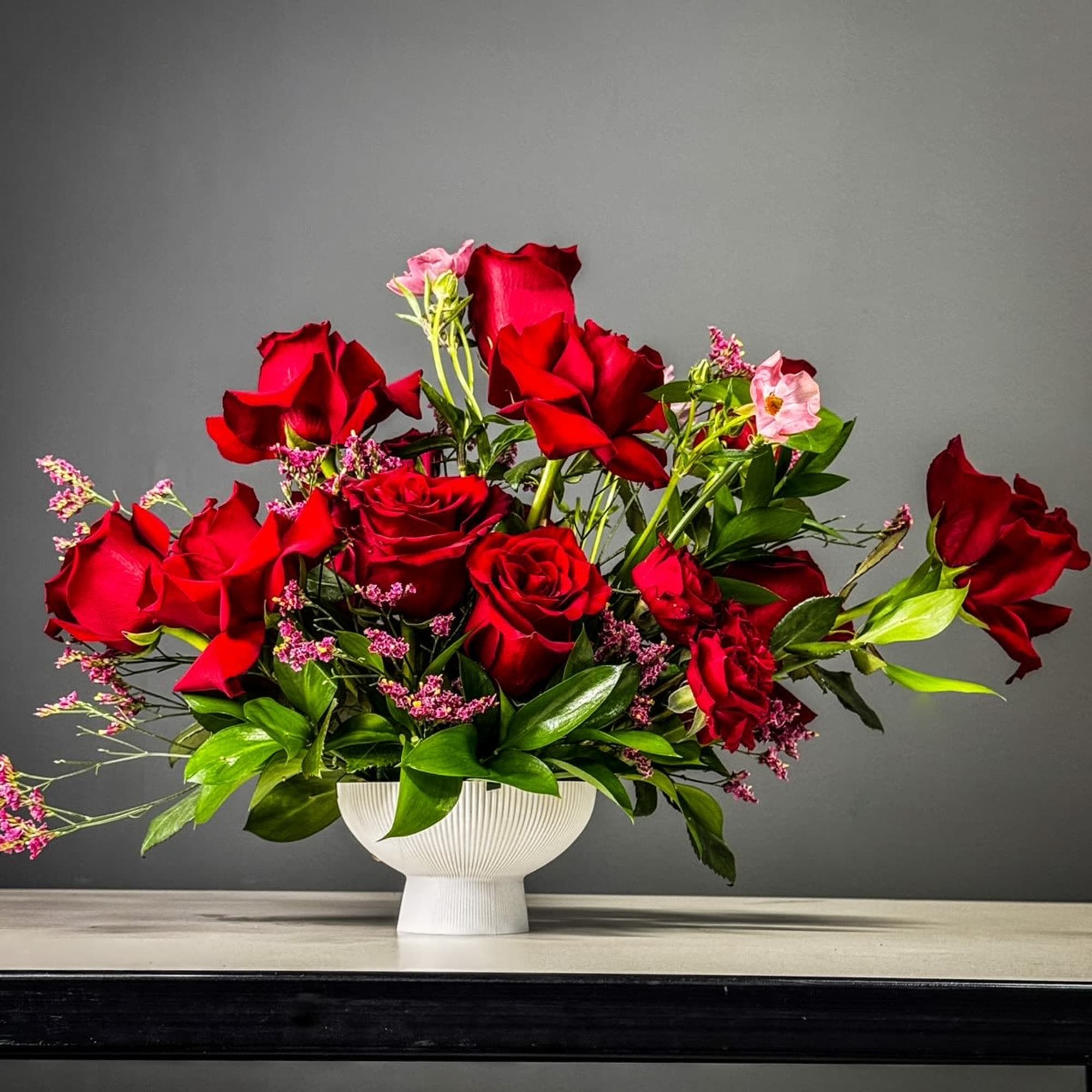 The "Eternal Beauty" flower centerpiece is a captivating arrangement that exudes timeless