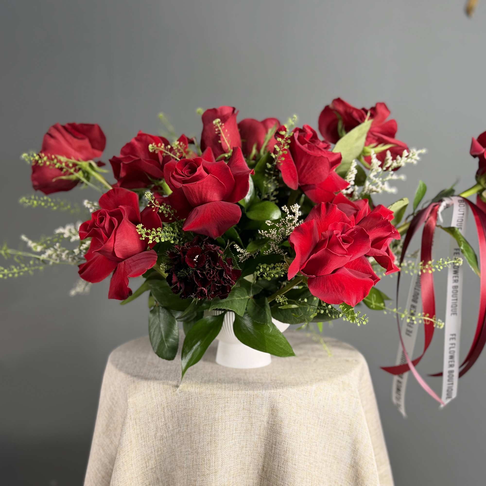 The "Eternal Beauty" flower centerpiece is a captivating arrangement that exudes timeless