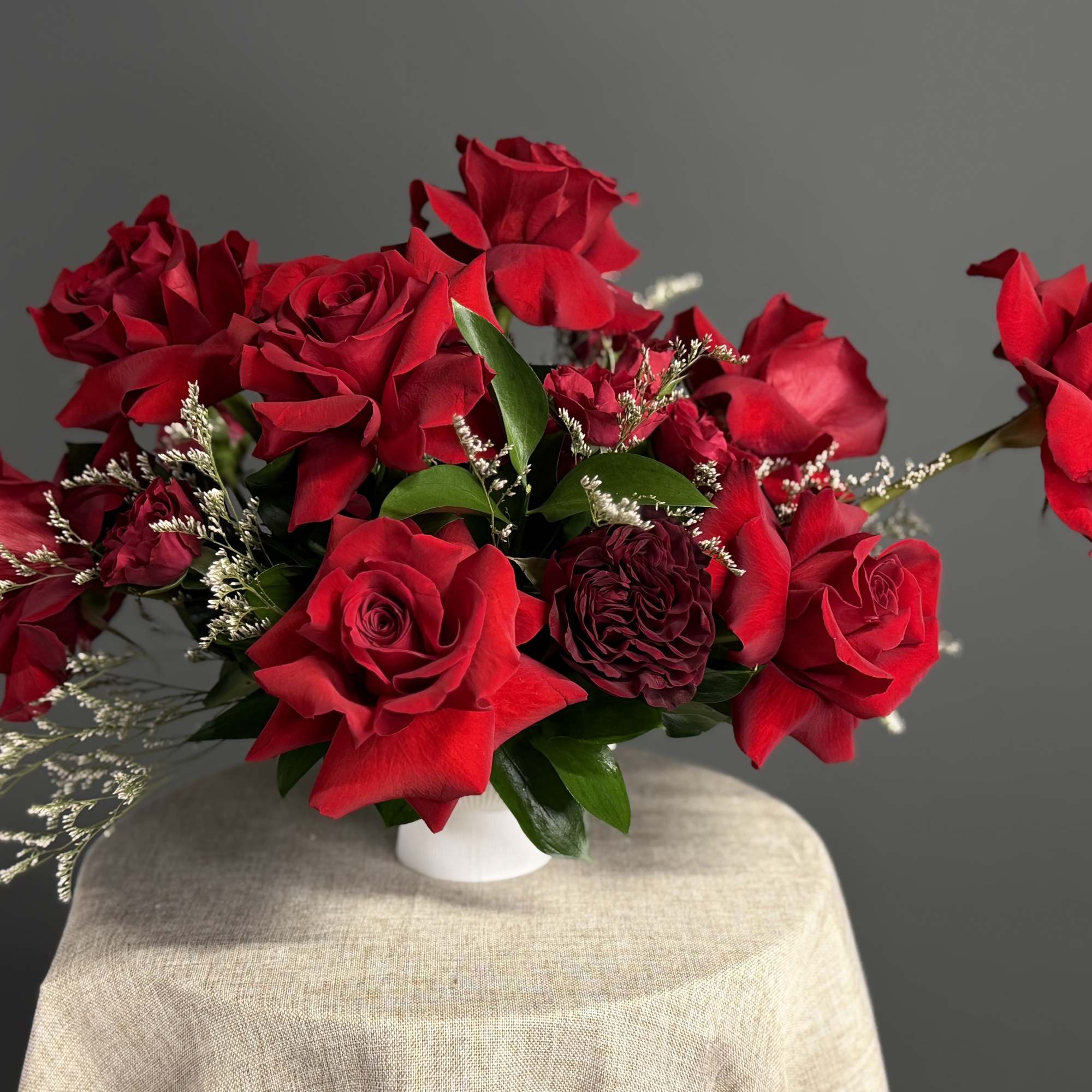 The "Eternal Beauty" flower centerpiece is a captivating arrangement that exudes timeless