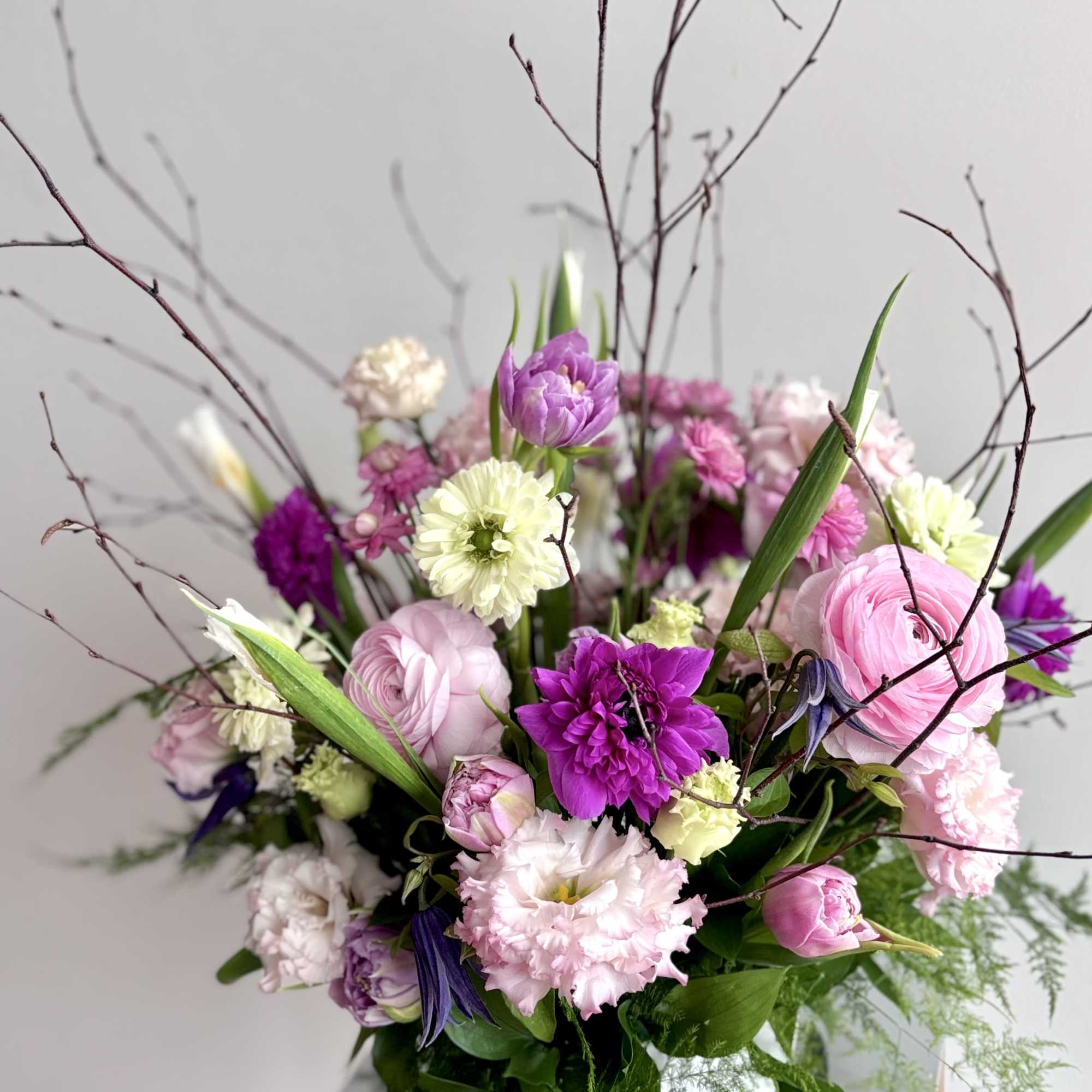 A fresh flower centerpiece for Easter with a rich variety of premium
