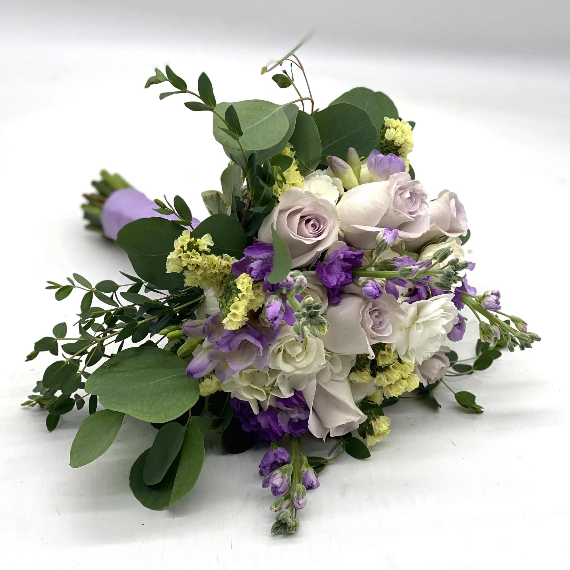 White Hydrangea, Lavender Rose, White Spray Roses, Pale Yellow Statice finished off