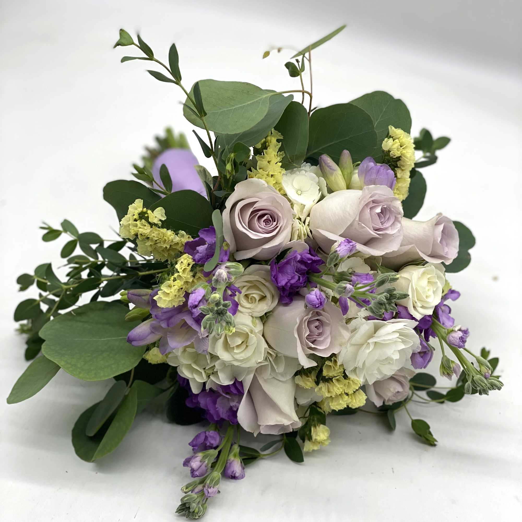 White Hydrangea, Lavender Rose, White Spray Roses, Pale Yellow Statice finished off