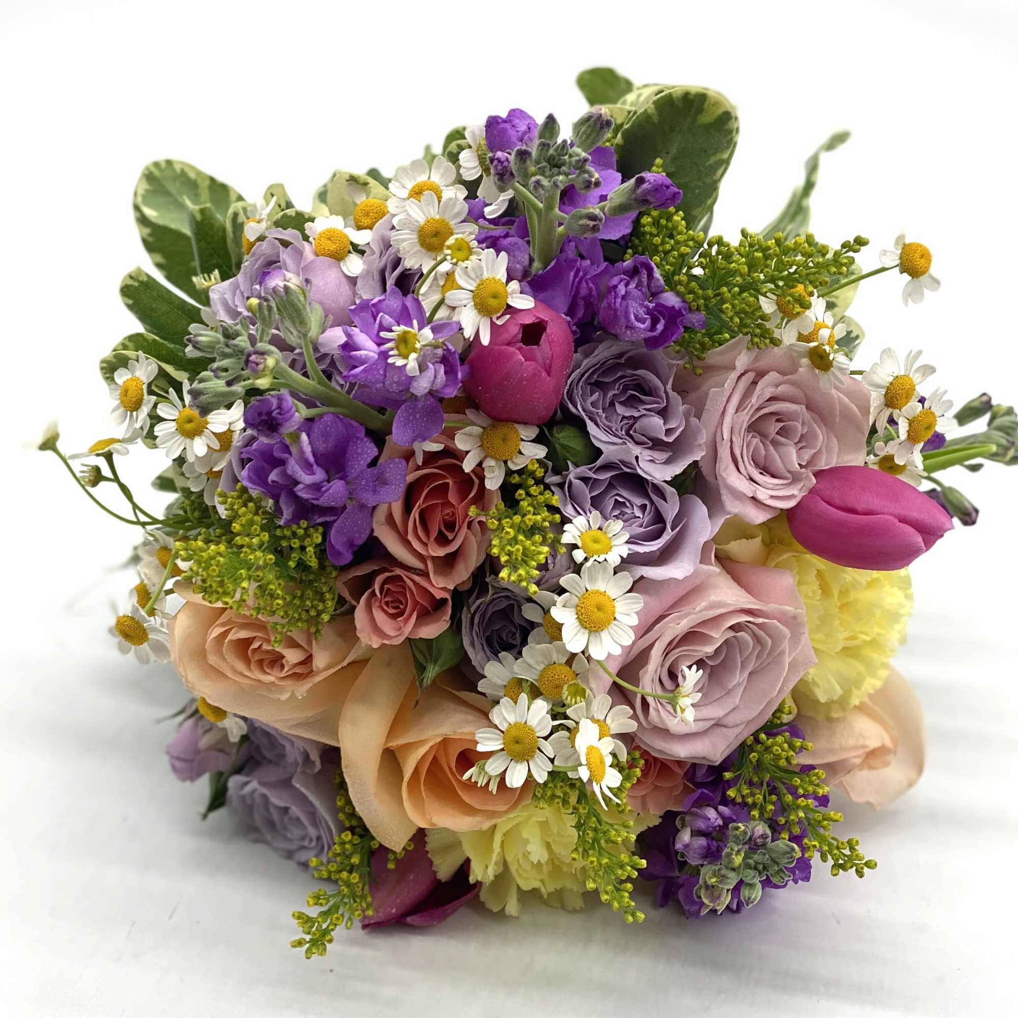 A beautiful mix of soft tones - lavender roses, pale yellow carnations
