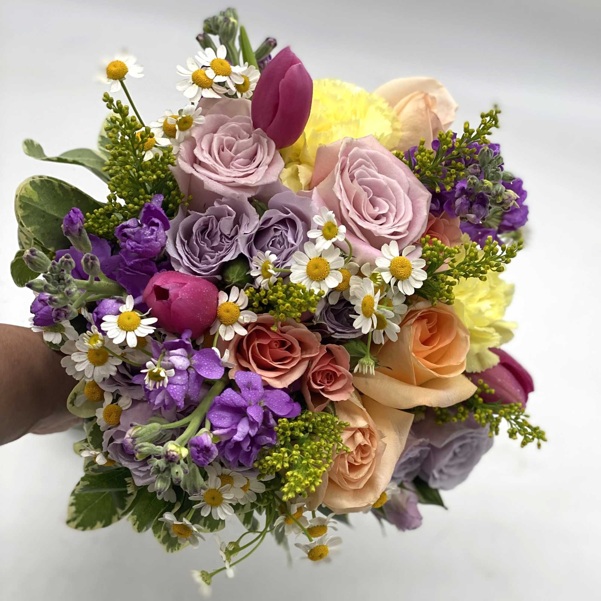 A beautiful mix of soft tones - lavender roses, pale yellow carnations