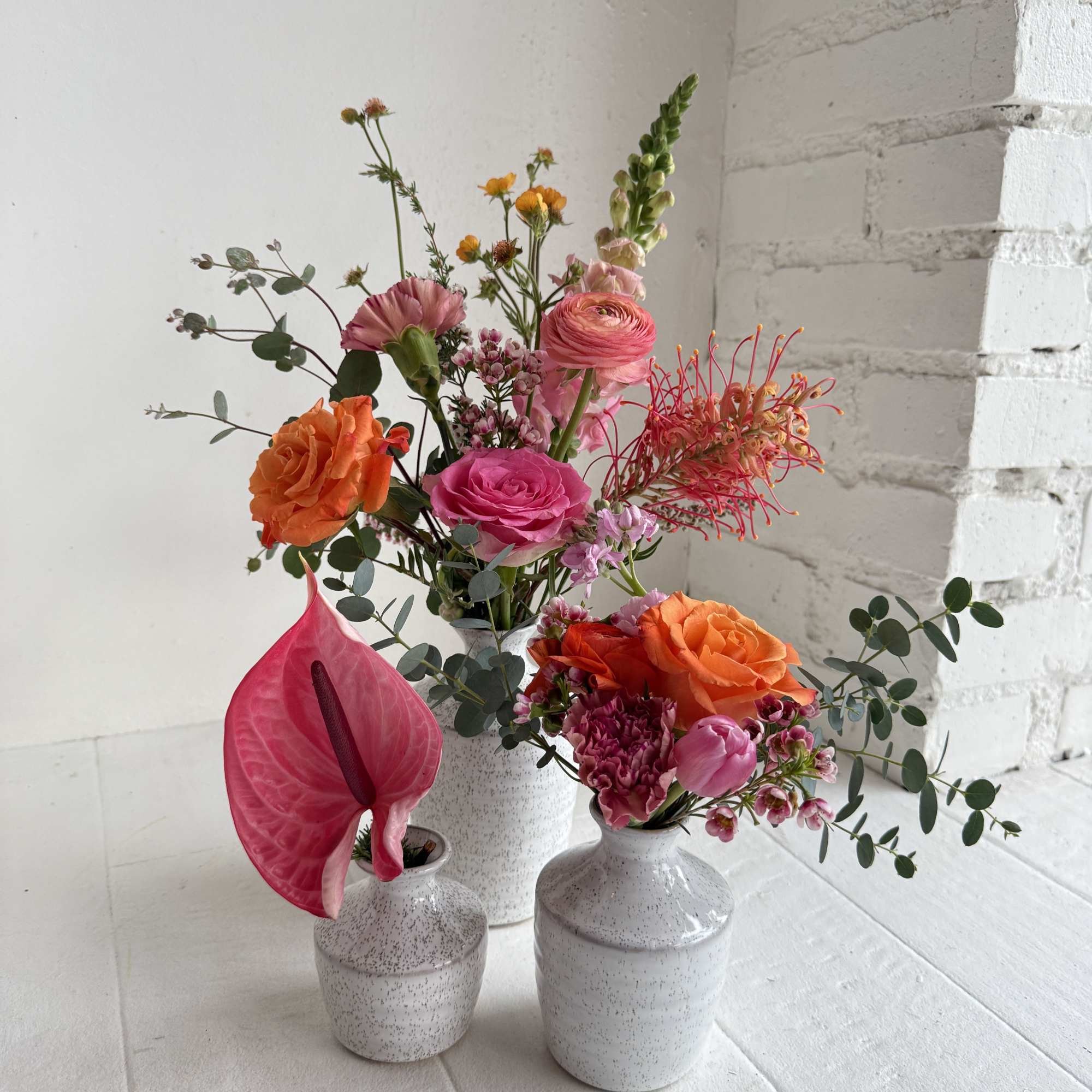 A fun eclectic mix of bright pinks and orange. Arrives in a