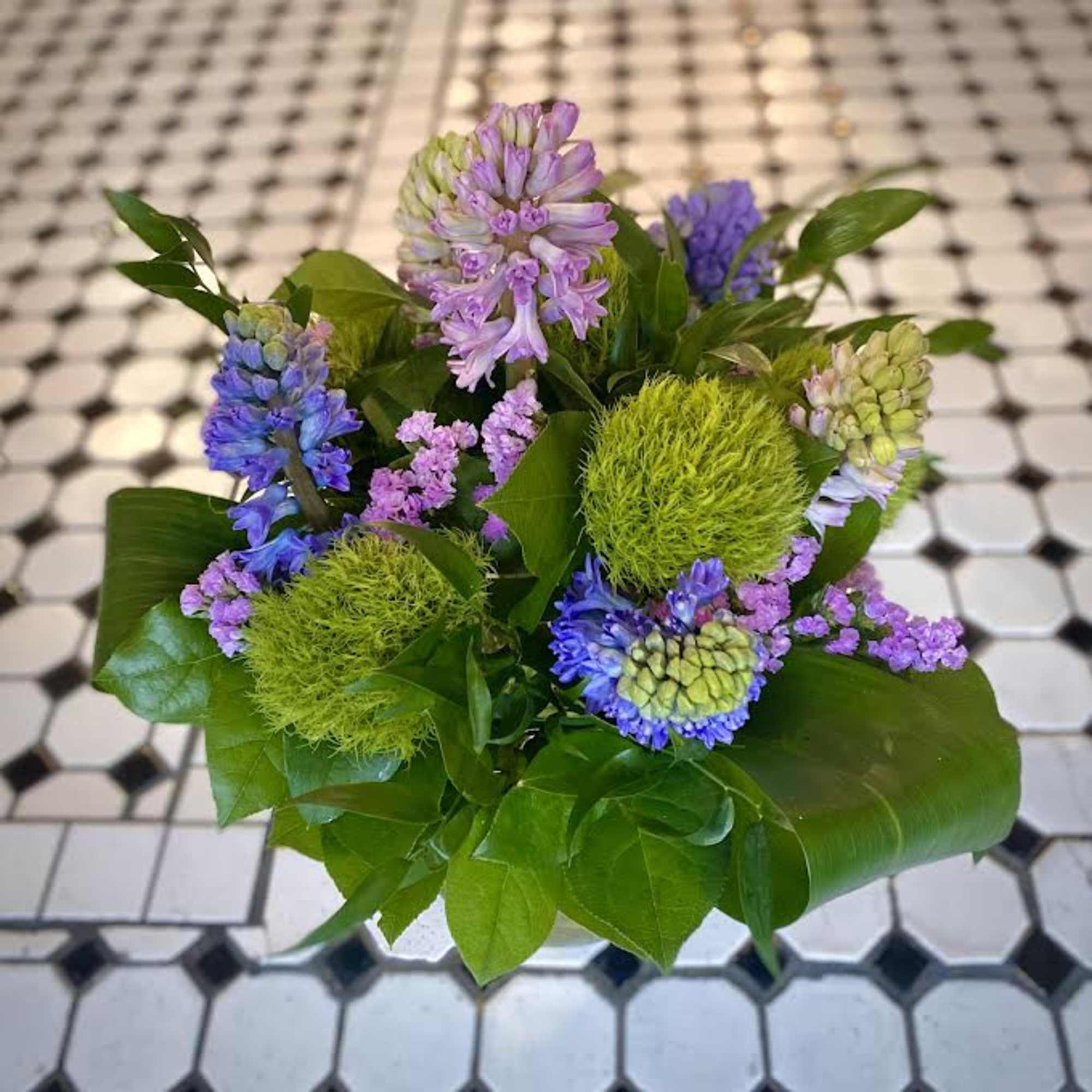 Full of fragrance and soft spring tones, this arrangement features a variety