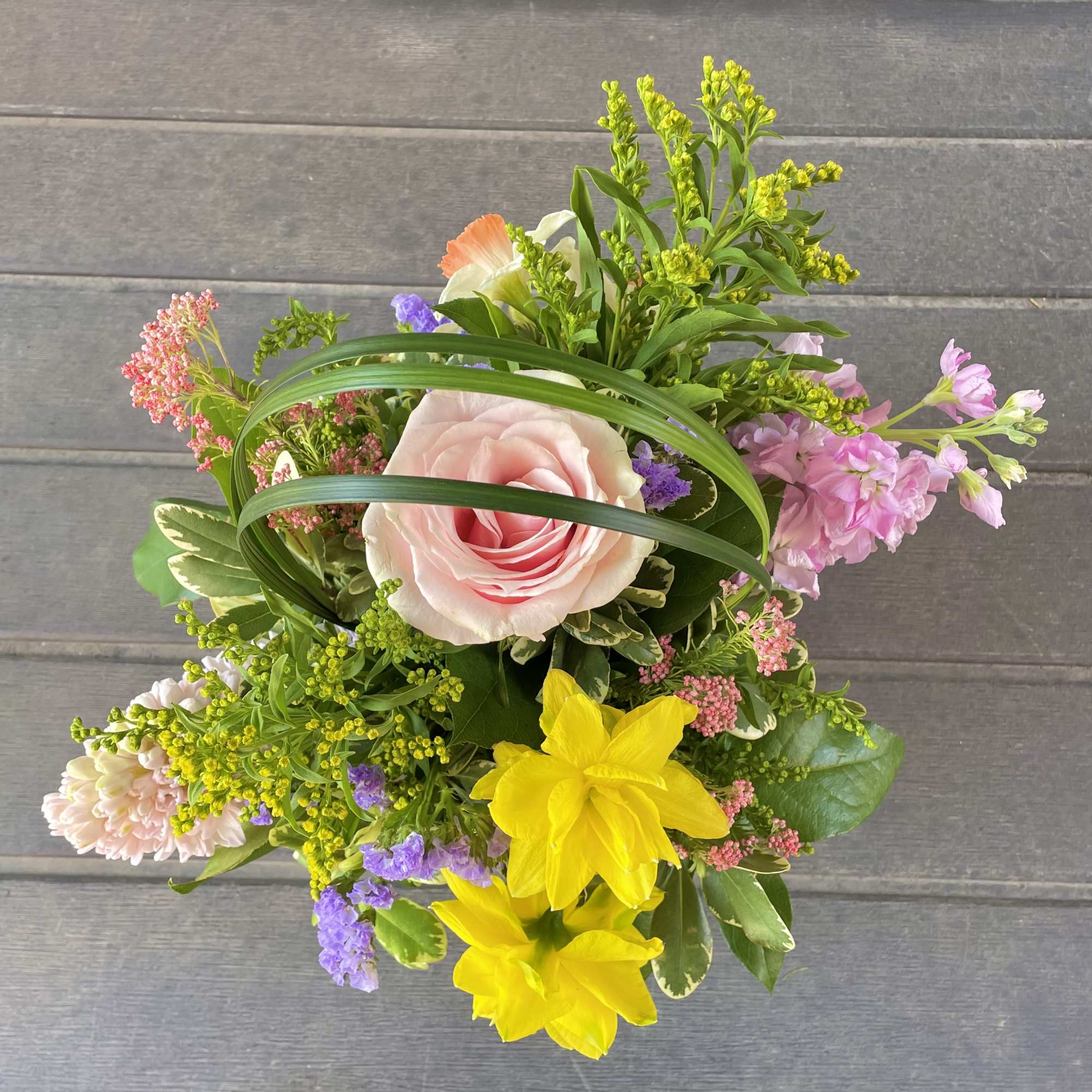 The '~Spring Dew~' is a fragrant arrangement full of joyful springtime flowers