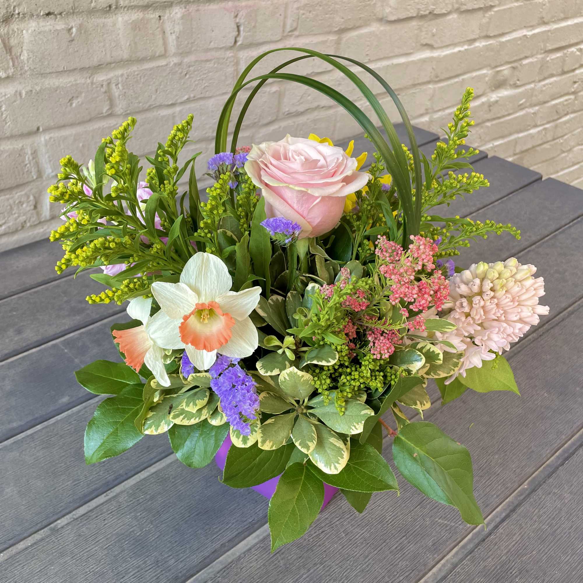 The '~Spring Dew~' is a fragrant arrangement full of joyful springtime flowers