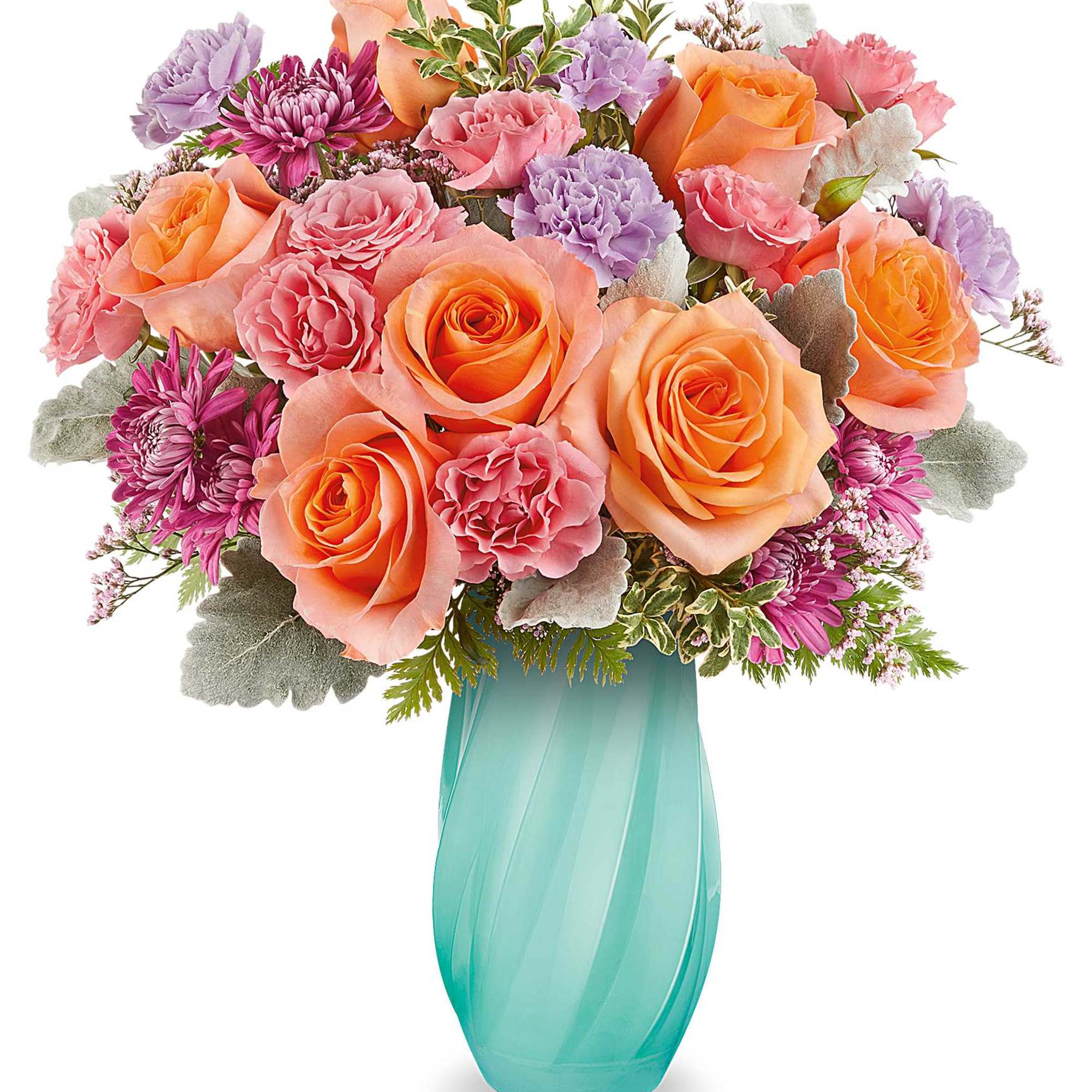 Mixed bouquet of peach and pink roses in a turquoise vase