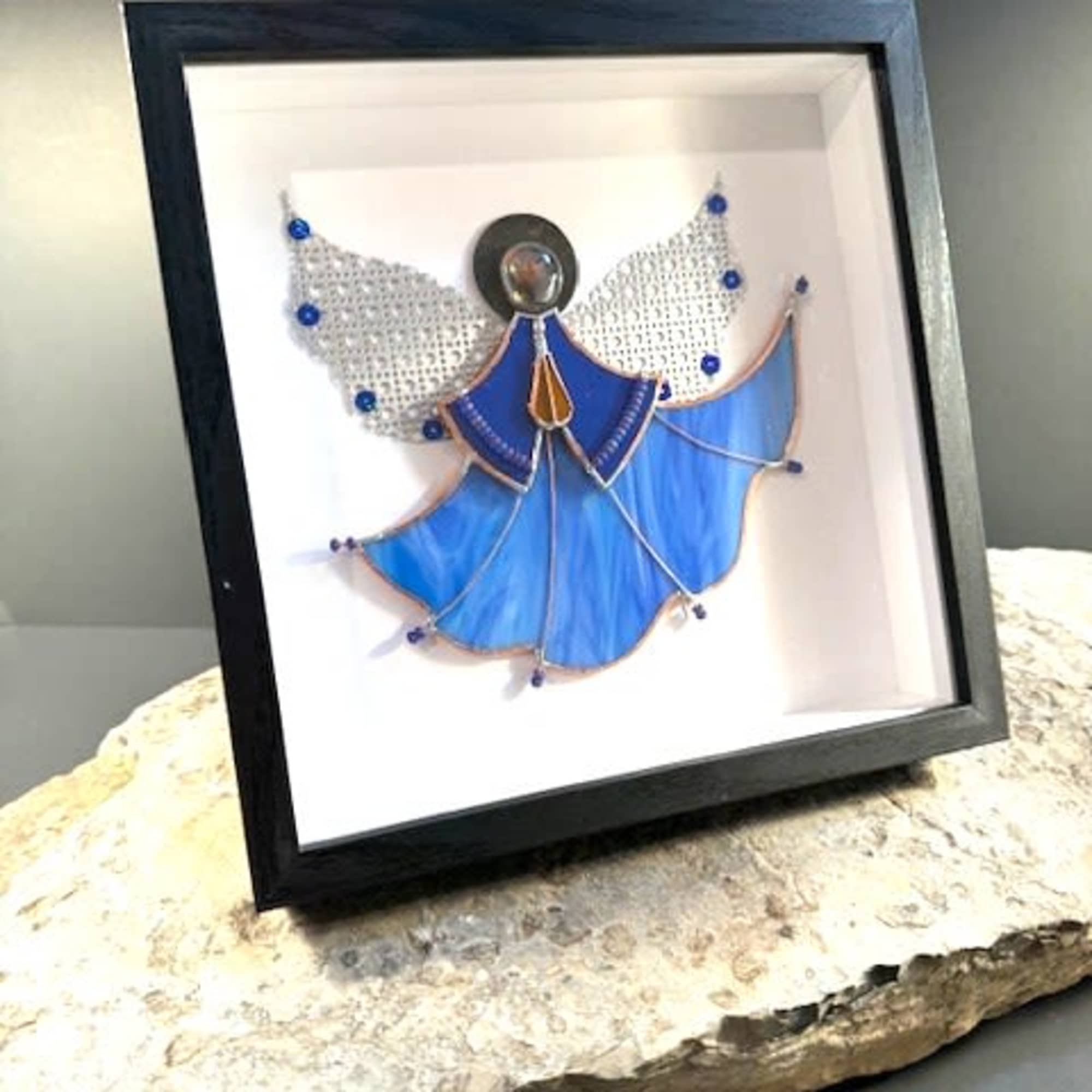 Firefly loves angels and this year were inspired to design our Framed