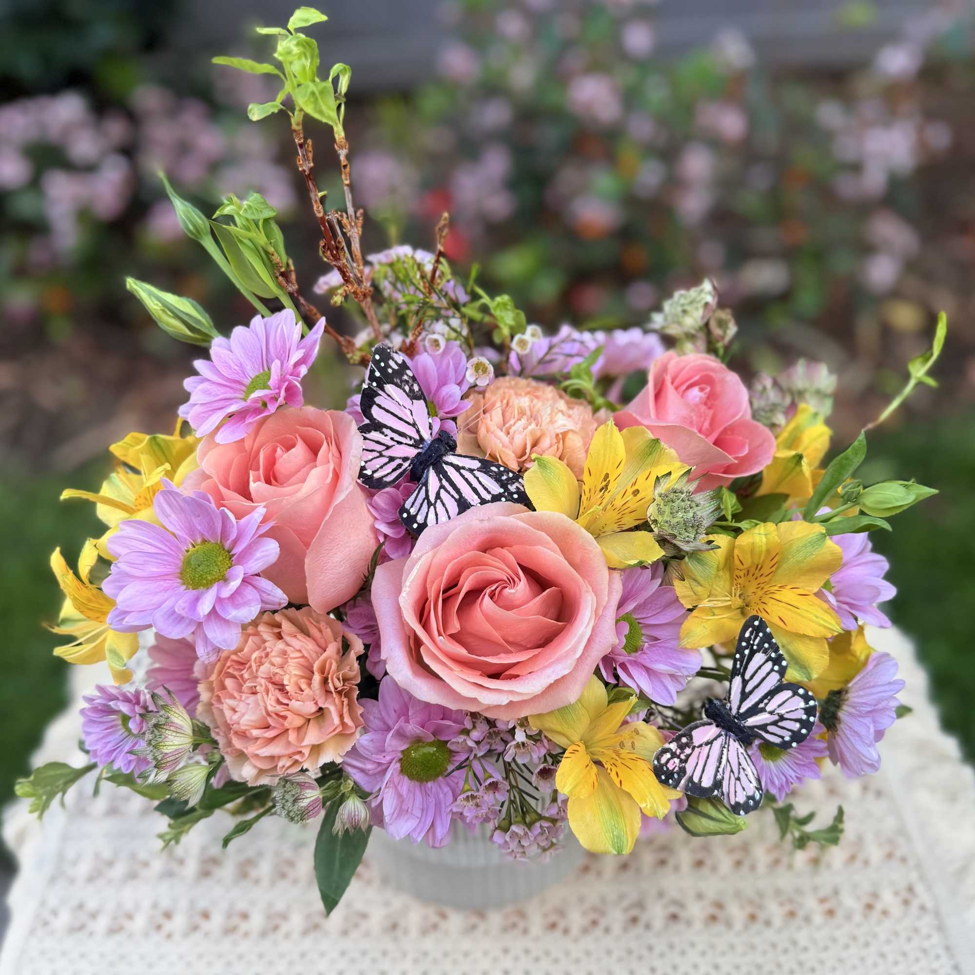 Spring at home with this gorgeous spring floral arrangement crafted with beautiful