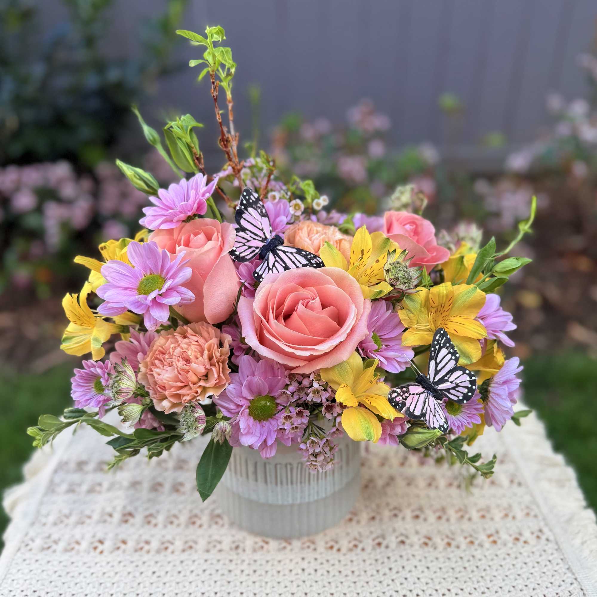 Spring at home with this gorgeous spring floral arrangement crafted with beautiful
