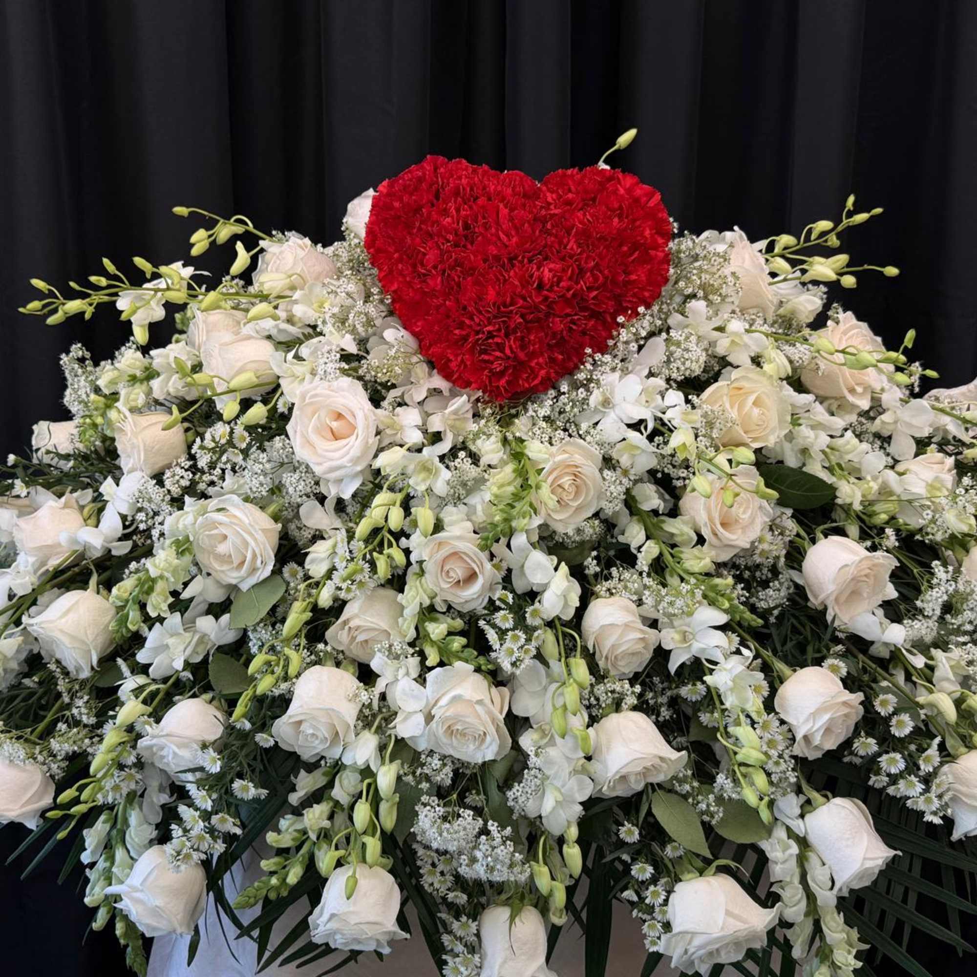 The Heart of Peace casket cover is a timeless expression of love