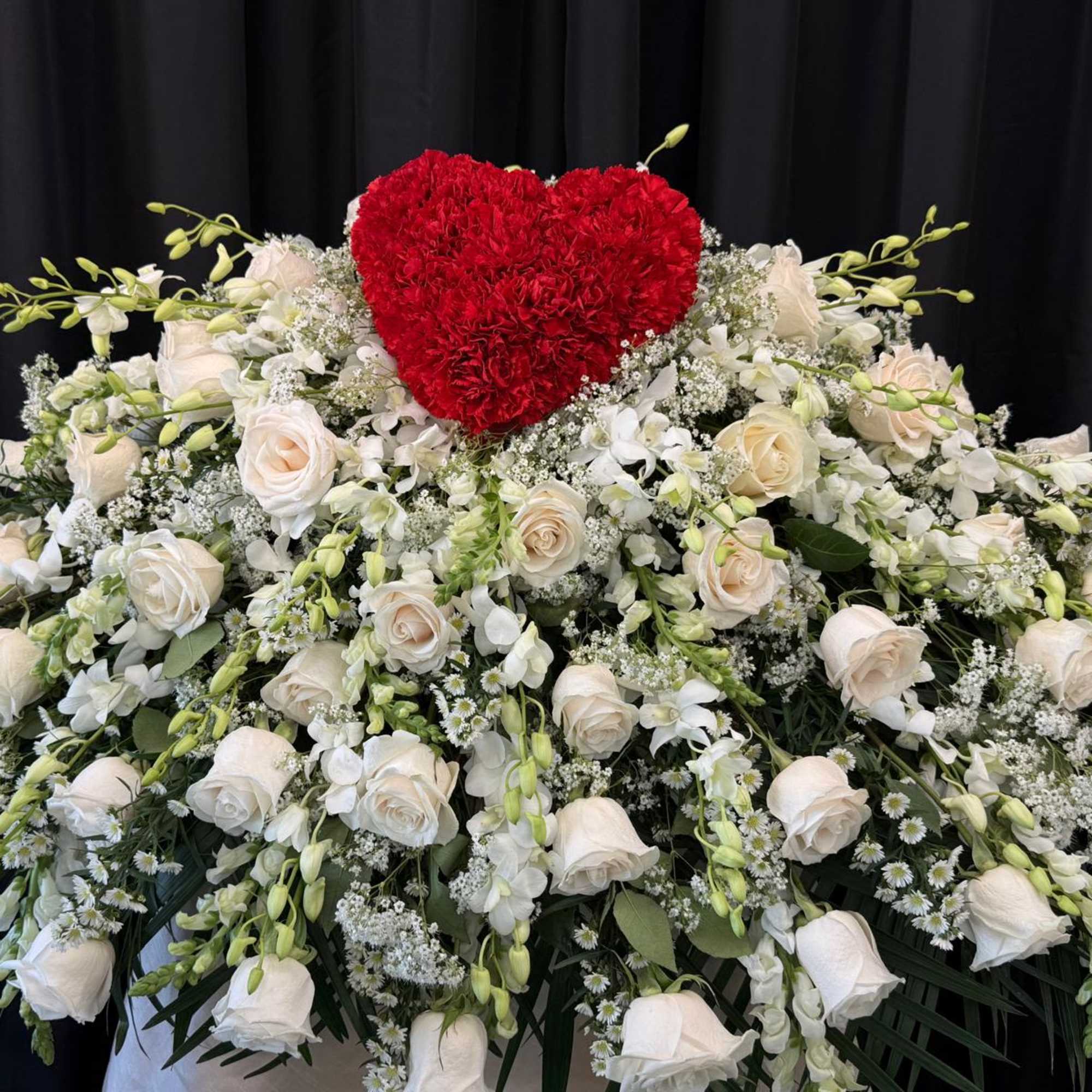 The Heart of Peace casket cover is a timeless expression of love