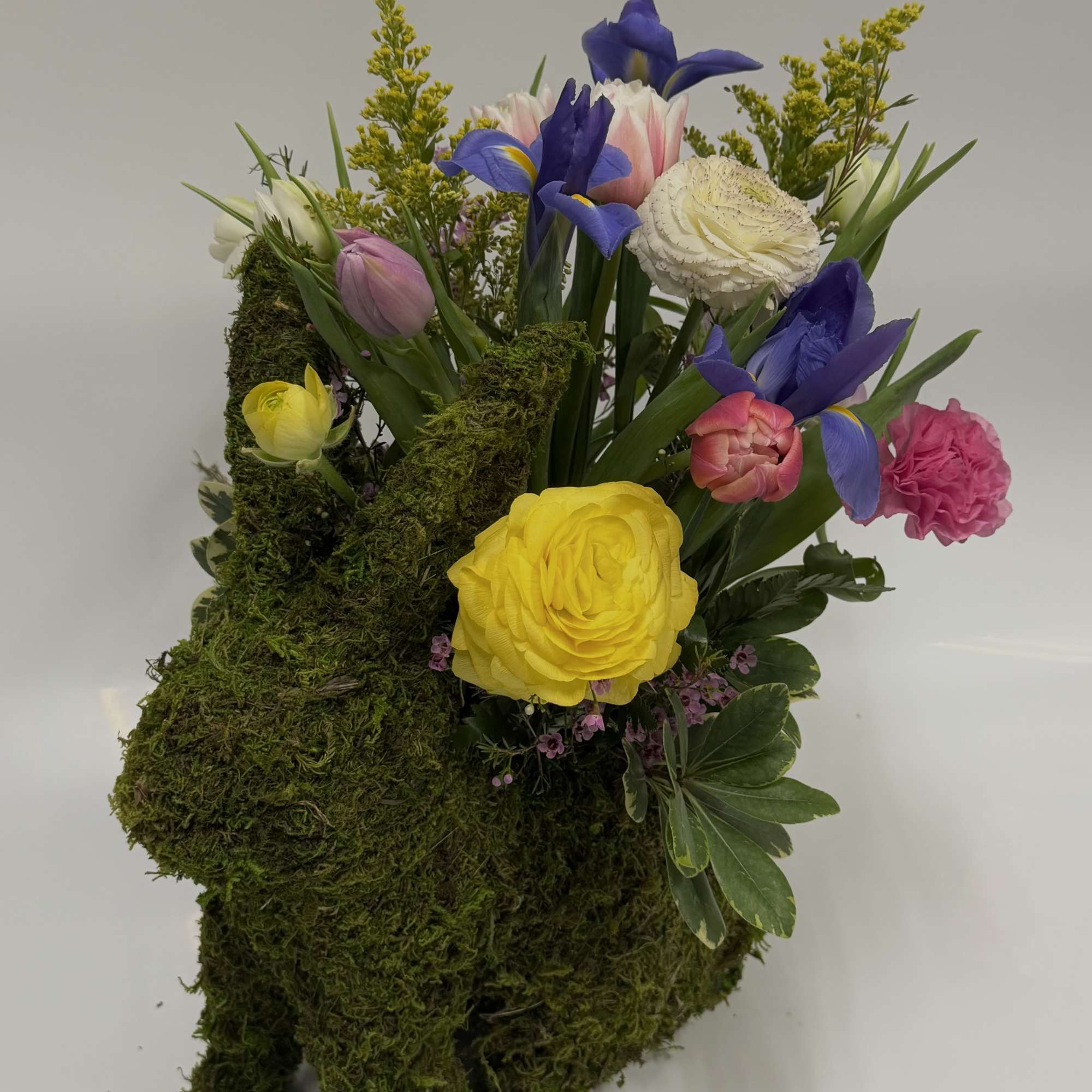 Bouquet will be delivered approximately as pictured. Tulips, Ranunculus, Iris and spring