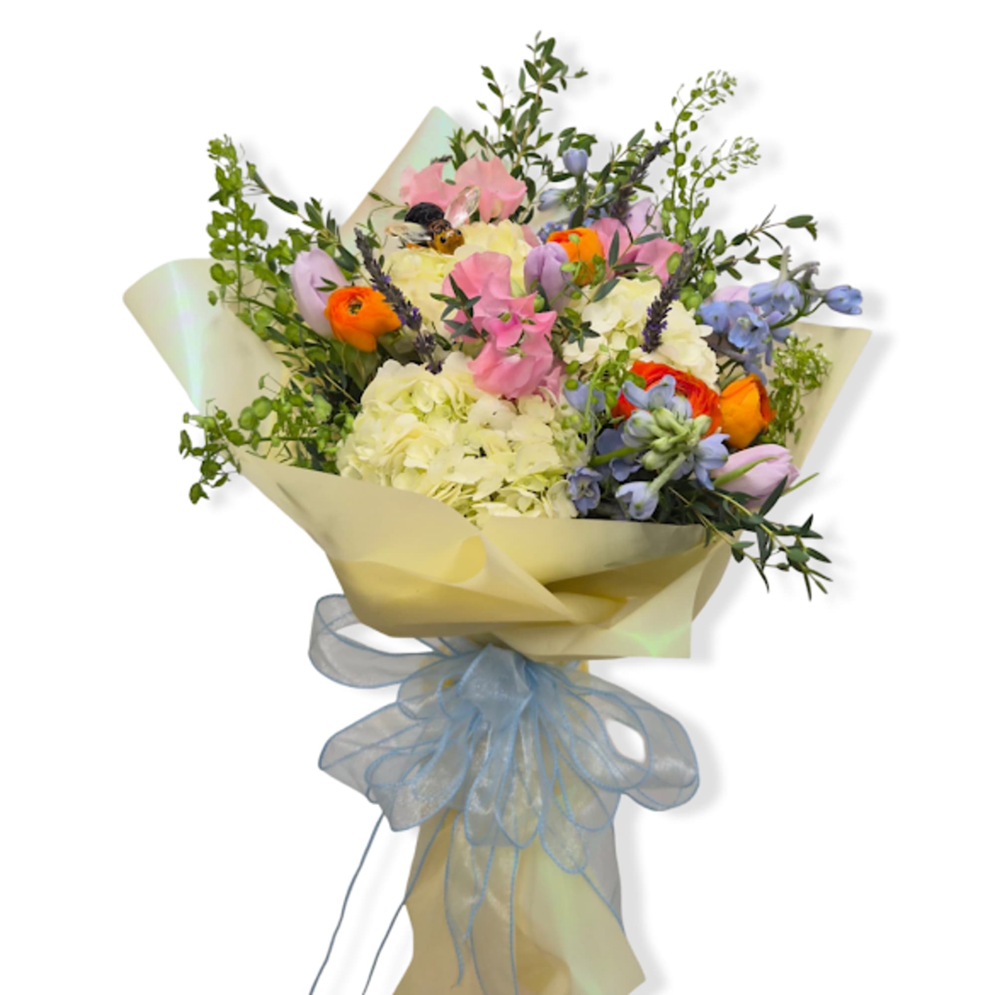 A vibrant and whimsical wrapped bouquet bursting with playful pops of color