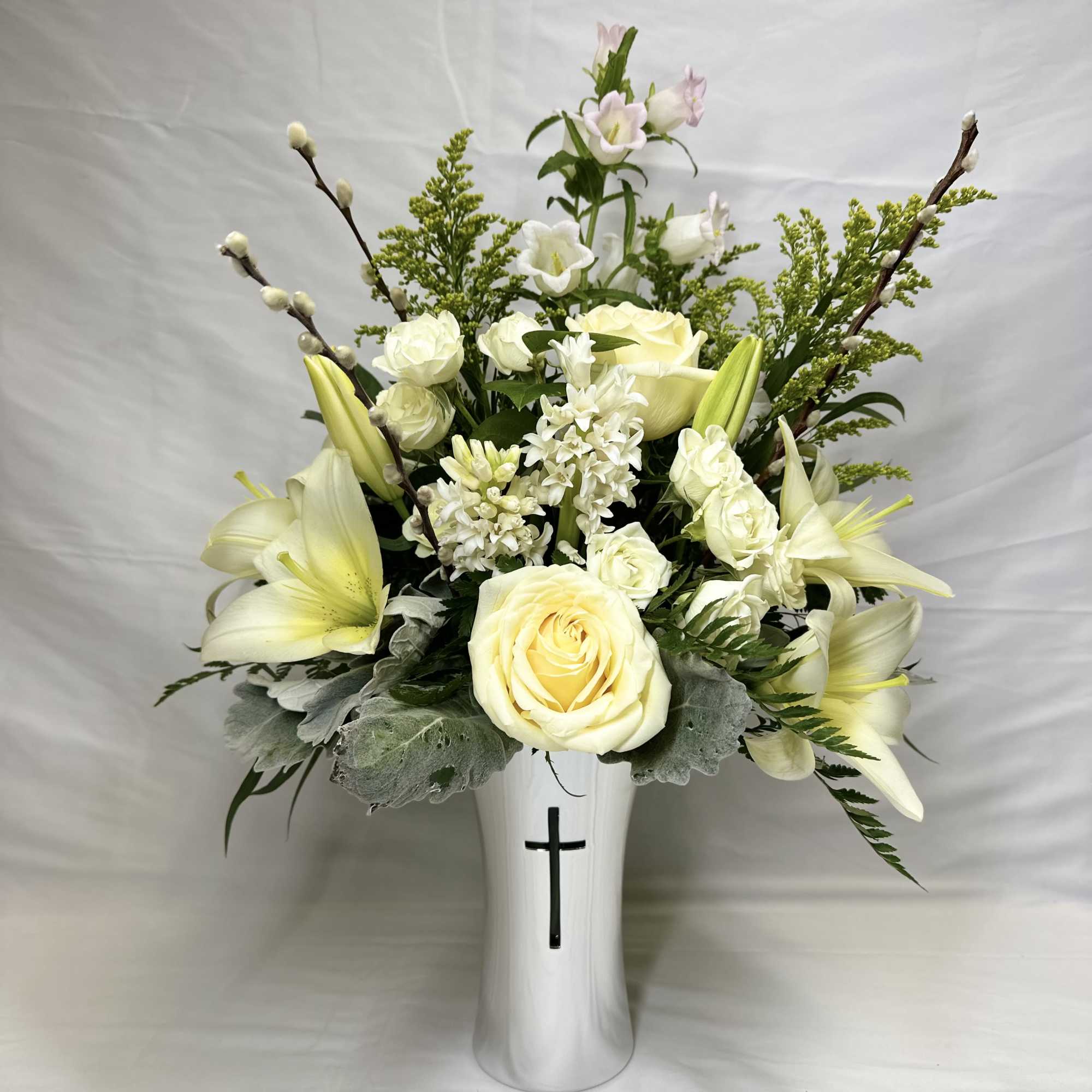 This thoughtful sympathy bouquet will look lovely for a service, or for
