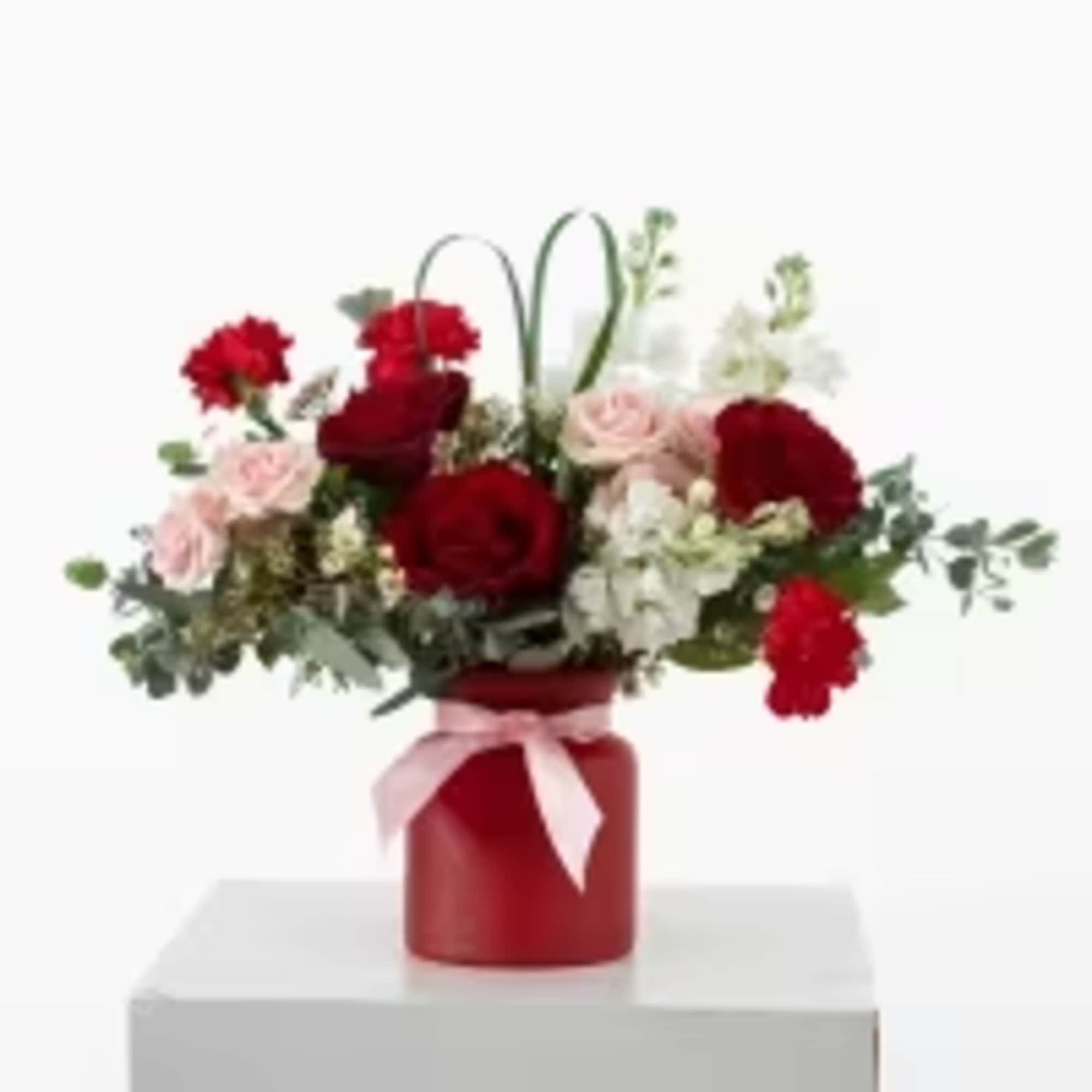 Get ready to swoon with our P.S. I Love You Floral Design