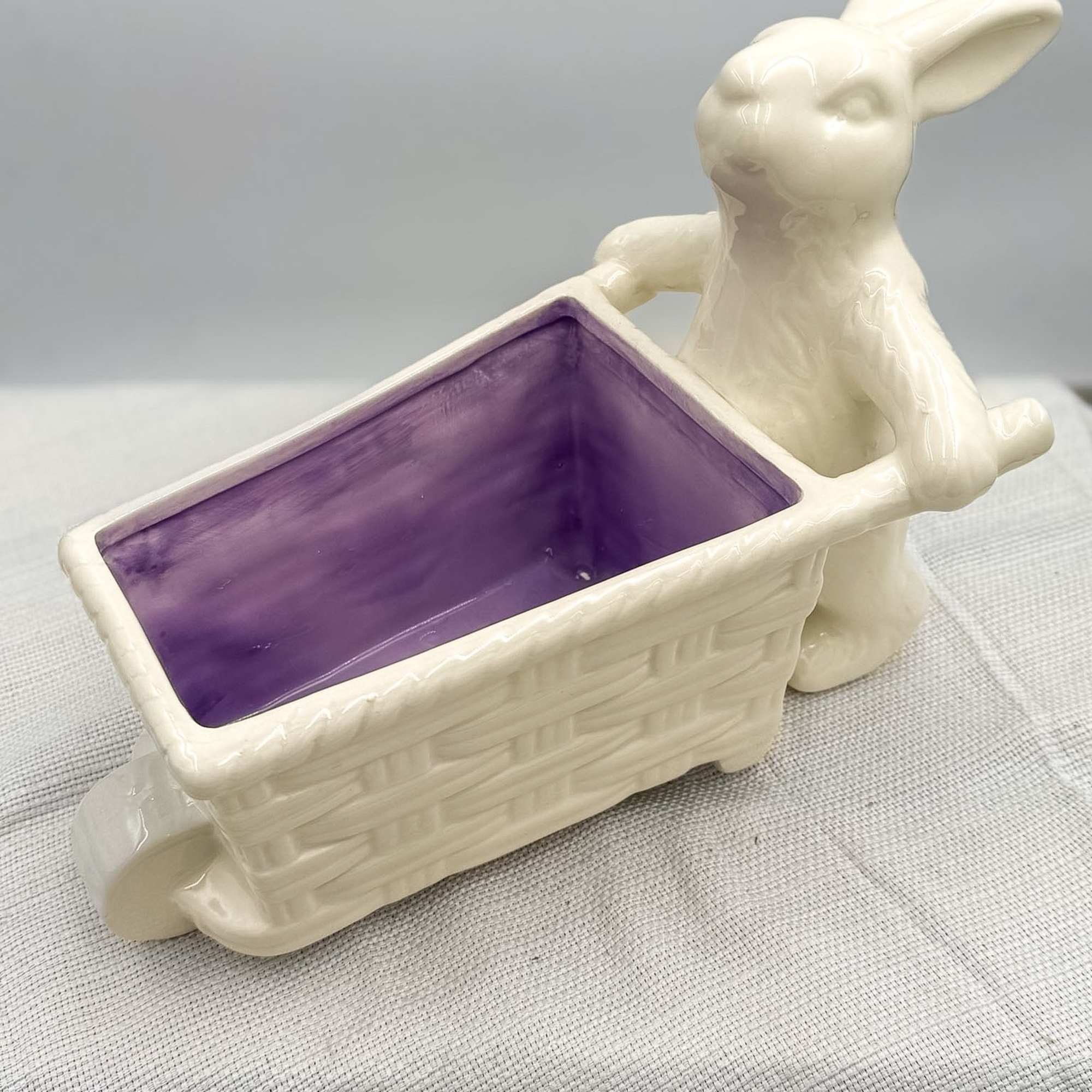 Spring blooms in an adorable Easter Bunny with wagon ceramic keepsake container.