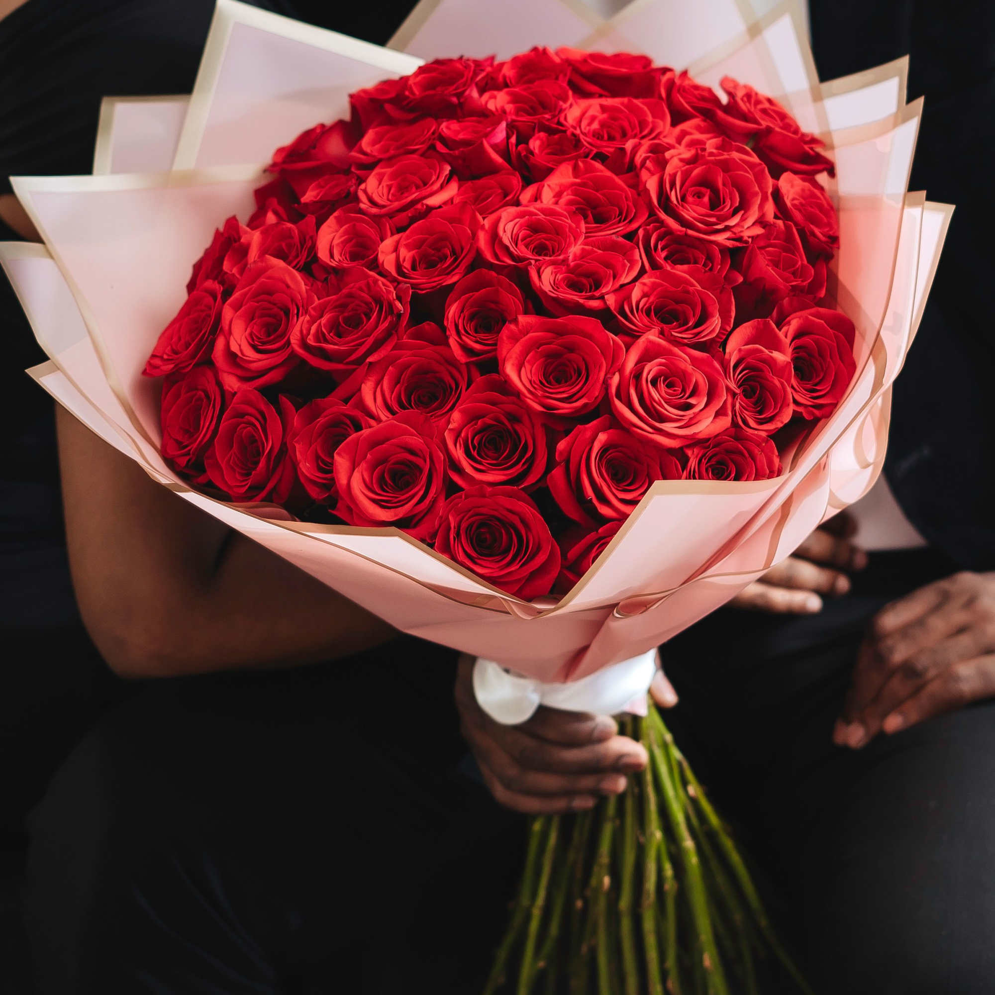 A beautiful round hand bouquet of your choice: 24, 48, or 75