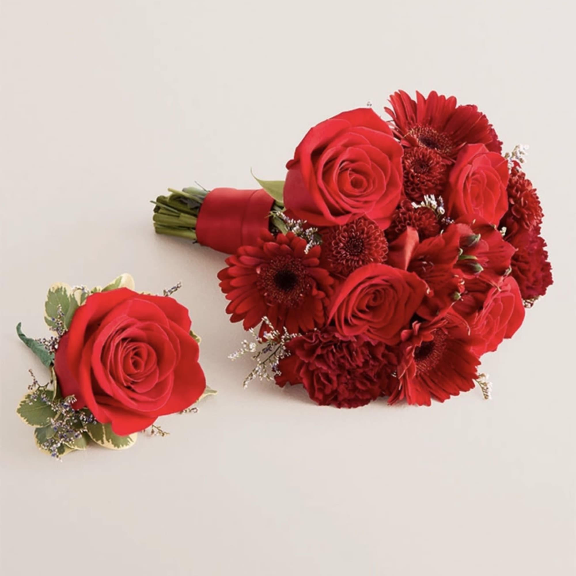 A beautifully coordinated bouquet and boutonniere set designed to complement each other