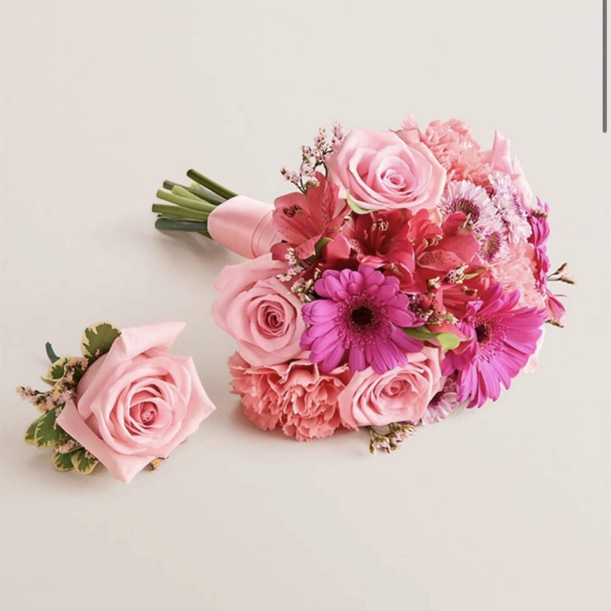 A beautifully coordinated bouquet and boutonniere set designed to complement each other