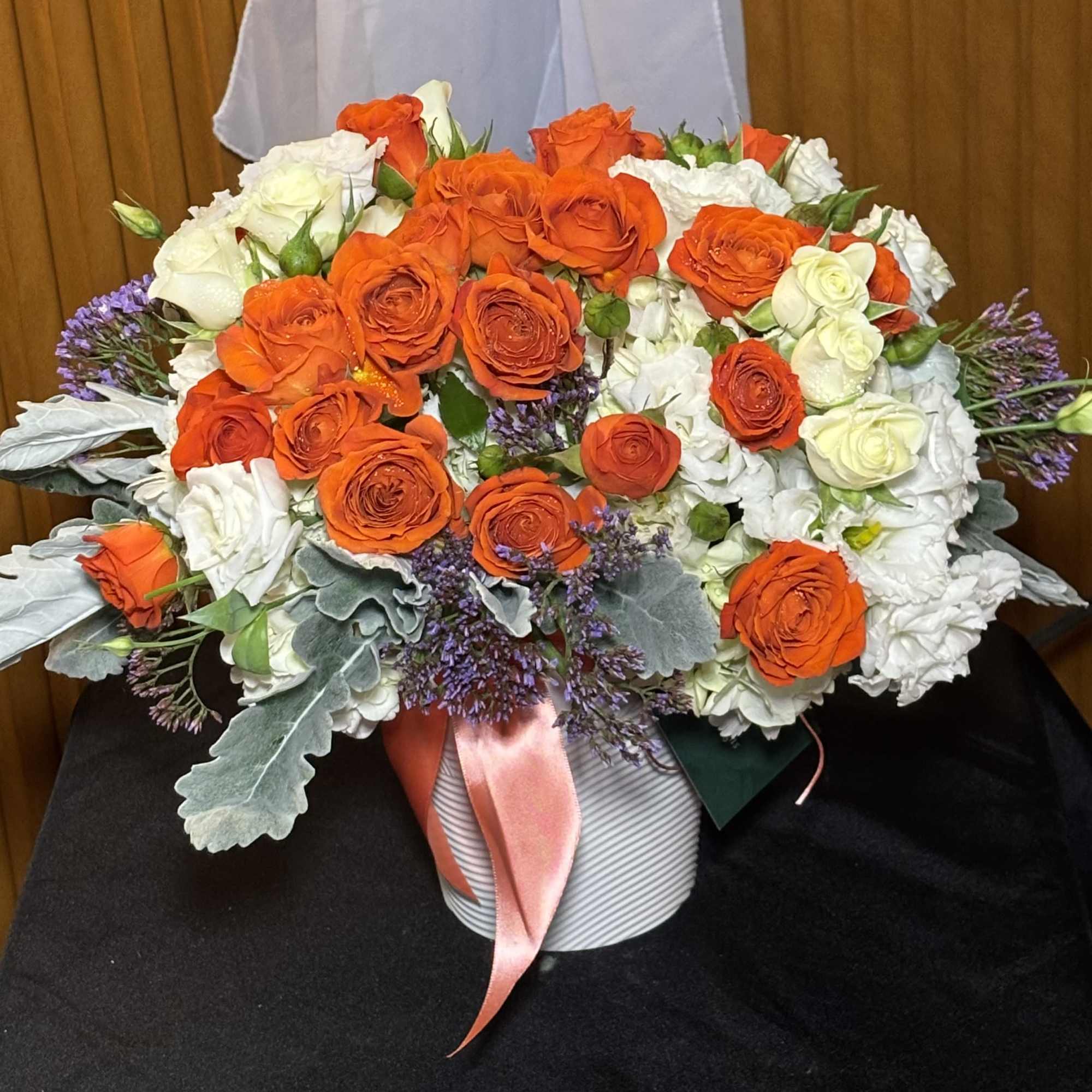 A modern and elegant floral arrangement designed to bring calm beauty and