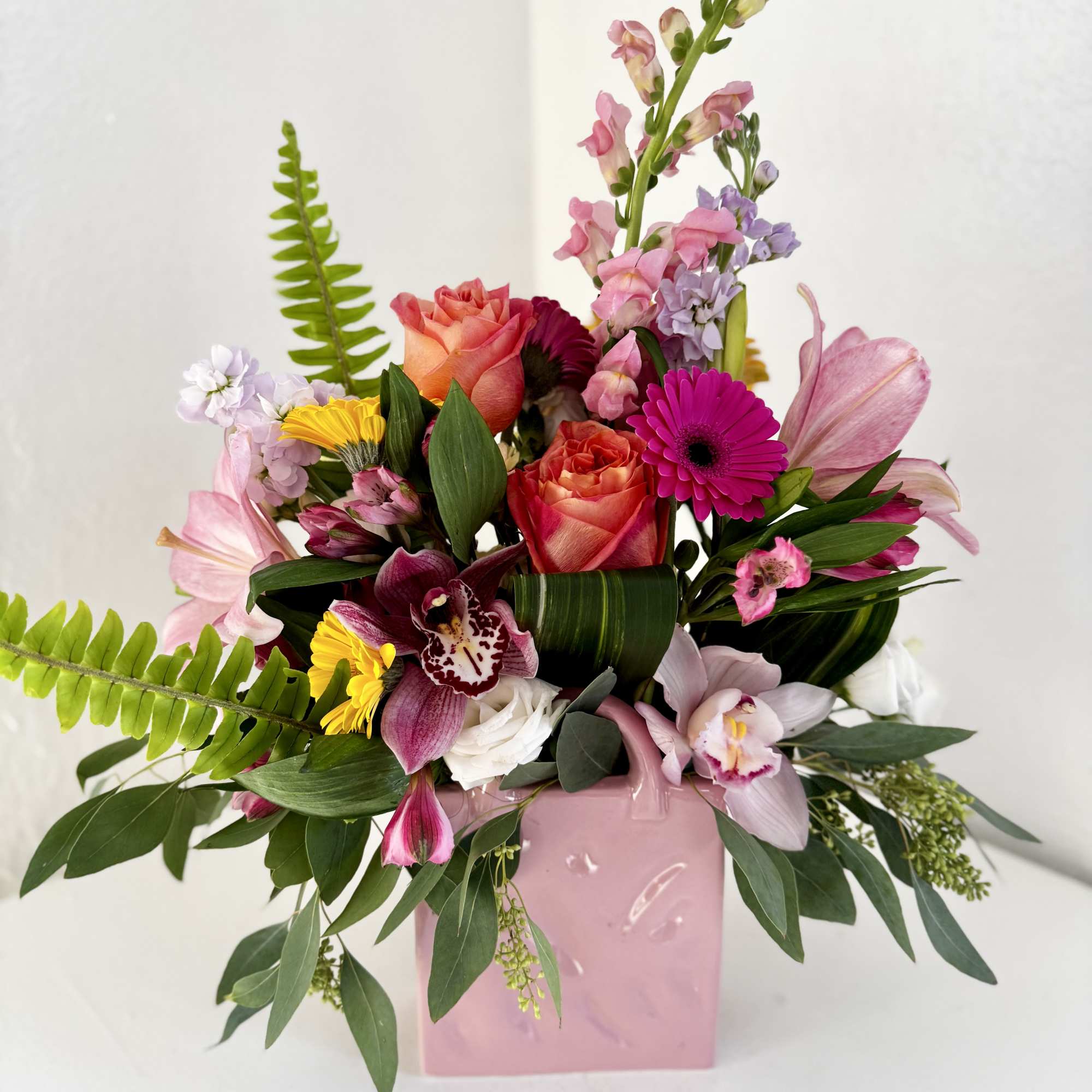 Give the gift of beauty in a bag with this gorgeous arrangement
