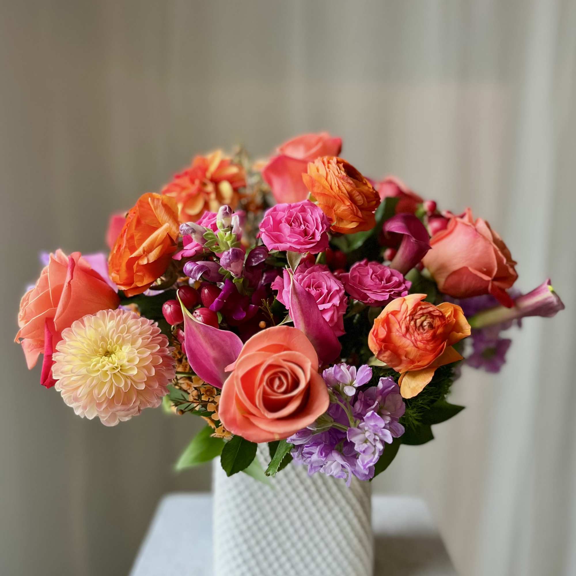 Brighten up the mood with this beautiful arrangement. Medium sized with a