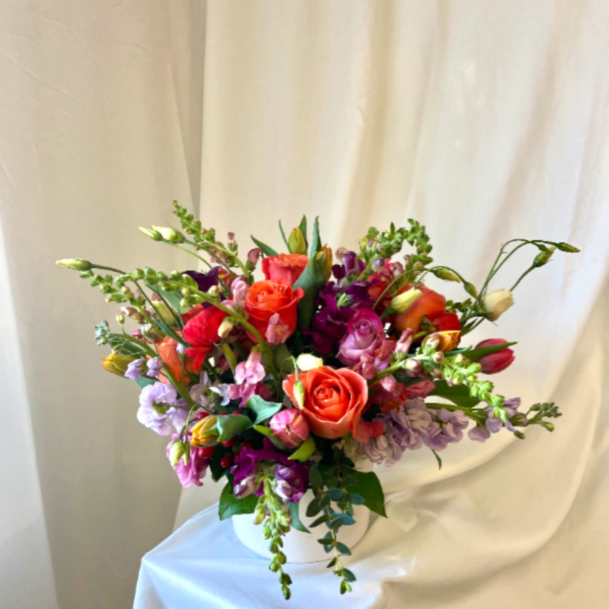 Brighten up the mood with this beautiful arrangement. Medium sized with a