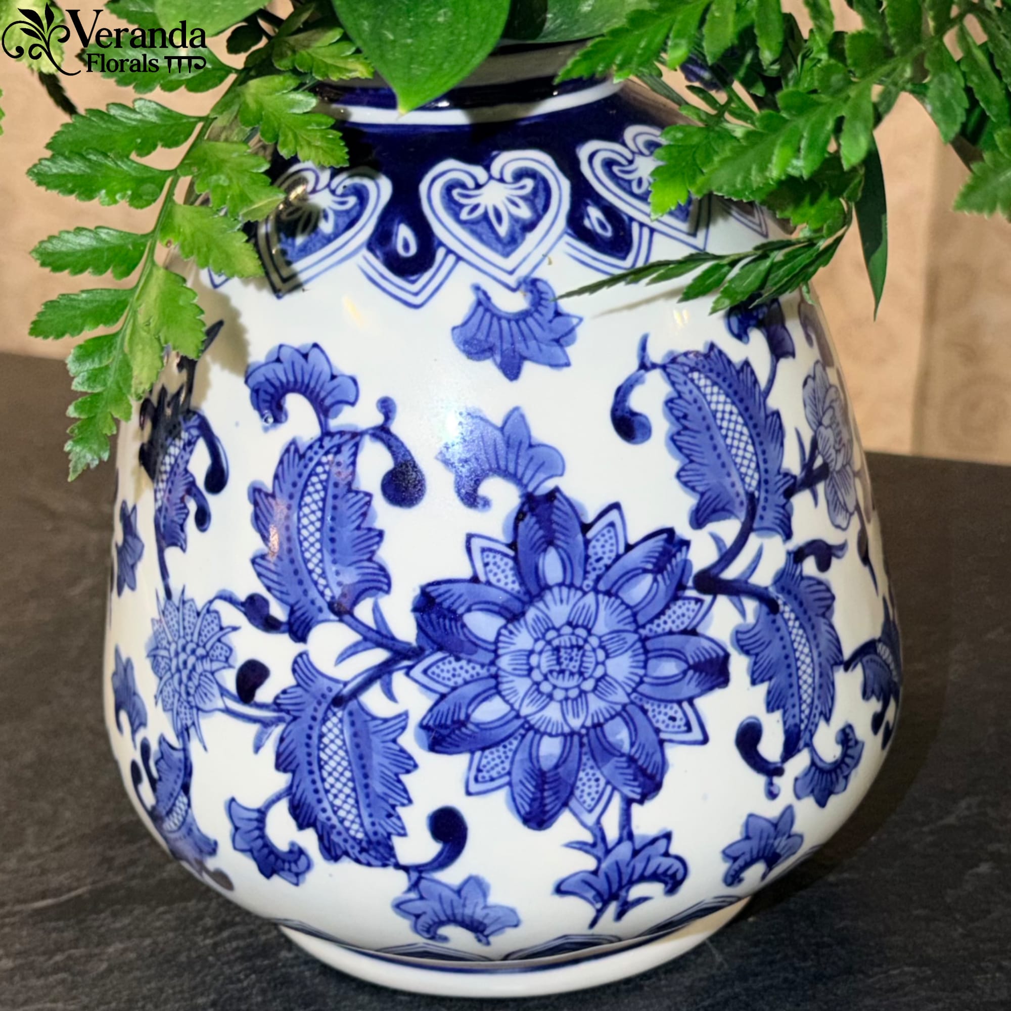 Elevate your home d&eacute;cor with this stunning blue and white Chinoiserie-style vase.